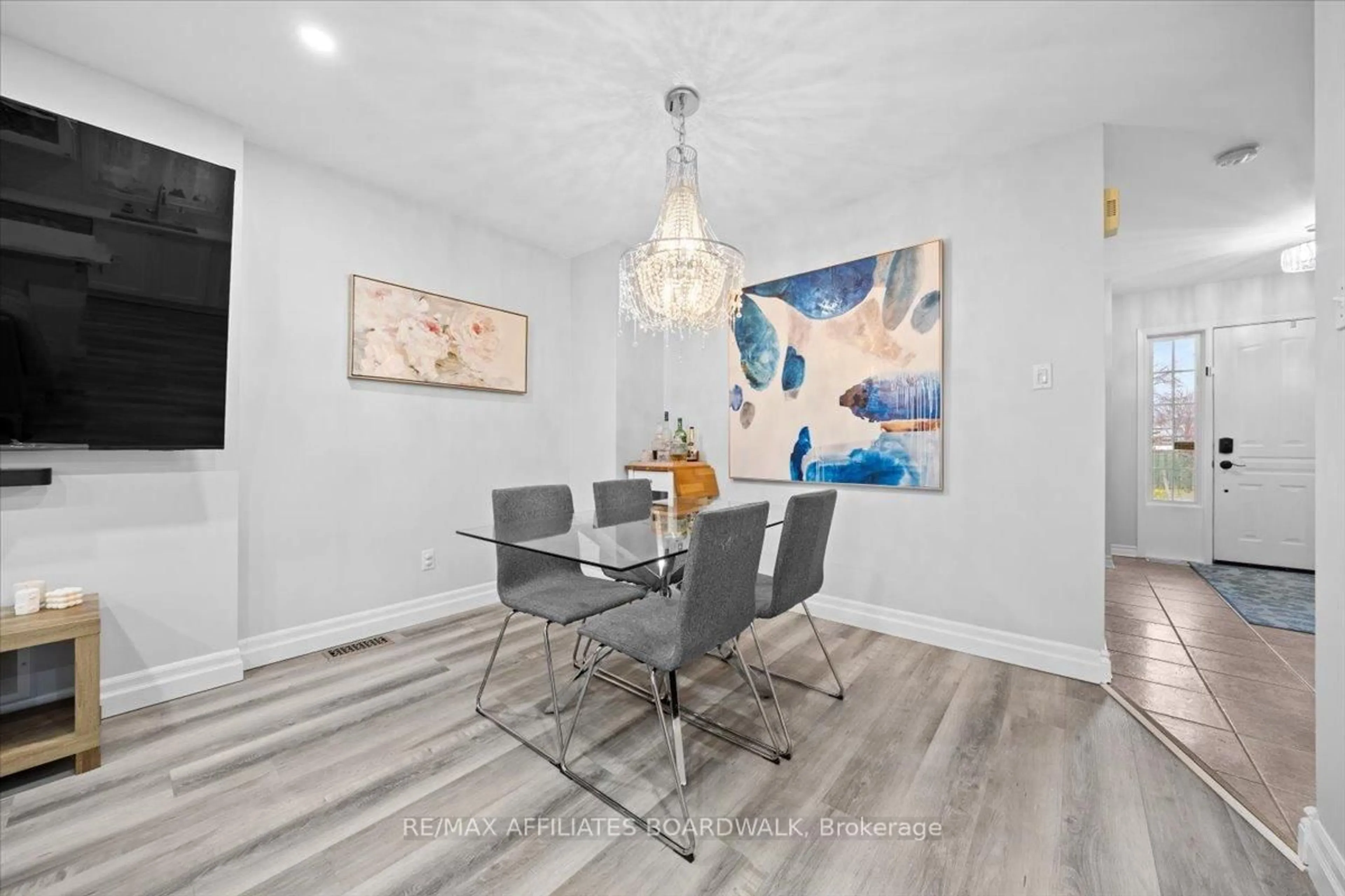 Dining room, wood/laminate floor for 34 Woodgate Way, Ottawa Ontario K2J 4C9