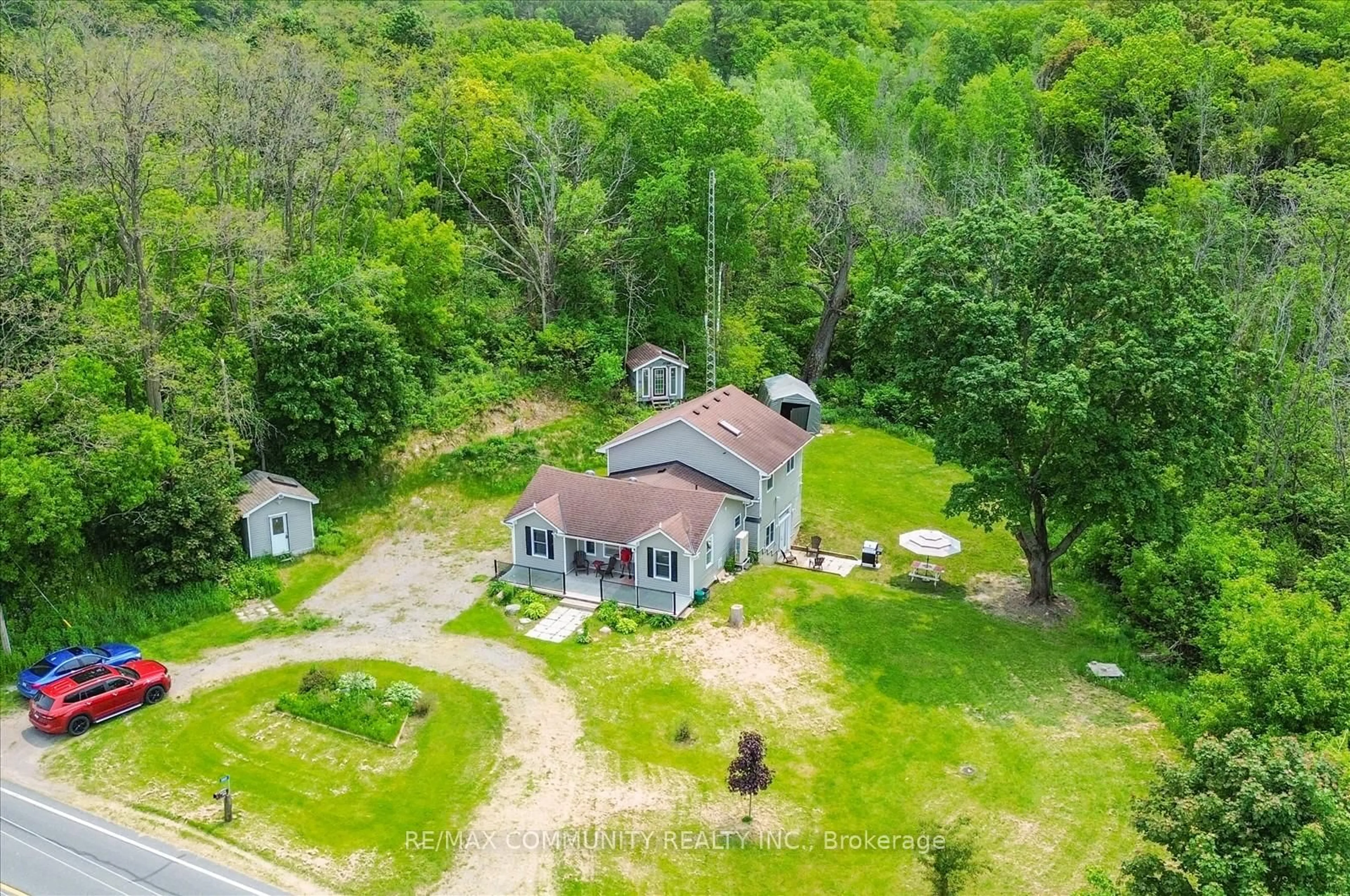 A pic from outside/outdoor area/front of a property/back of a property/a pic from drone, unknown for 5661 Rice Lake Scenic Dr, Hamilton Township Ontario K0K 2E0