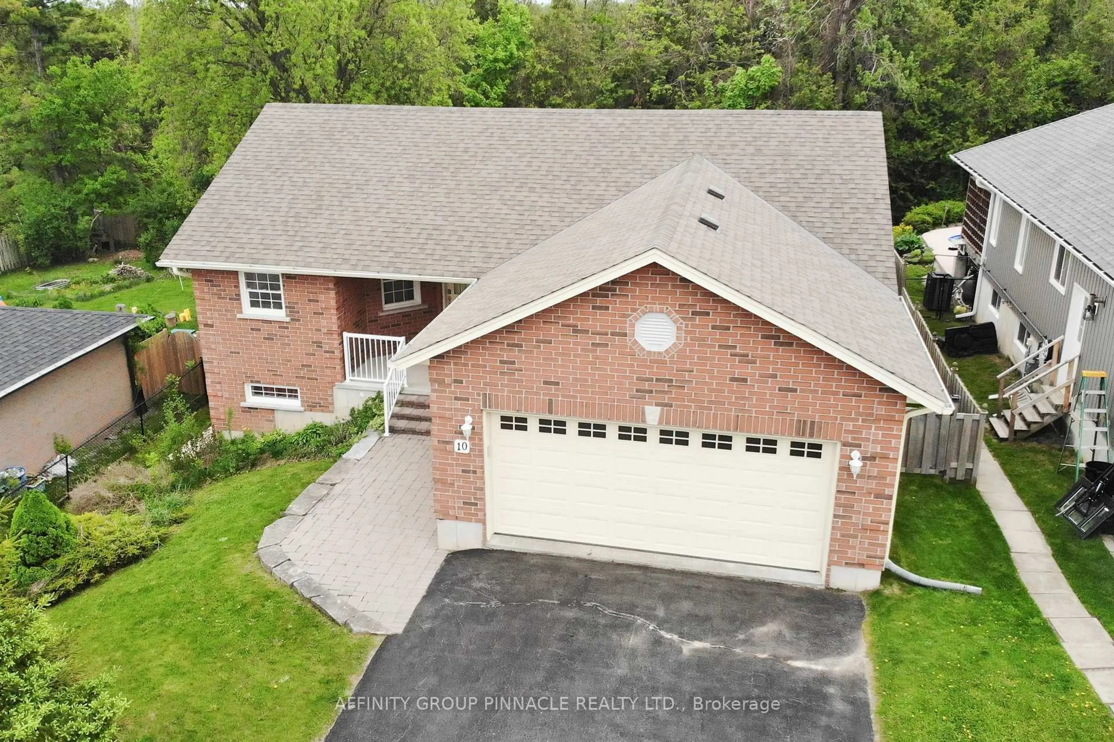 A pic from outside/outdoor area/front of a property/back of a property/a pic from drone, street for 10 Champlain Blvd, Kawartha Lakes Ontario K9V 0H9