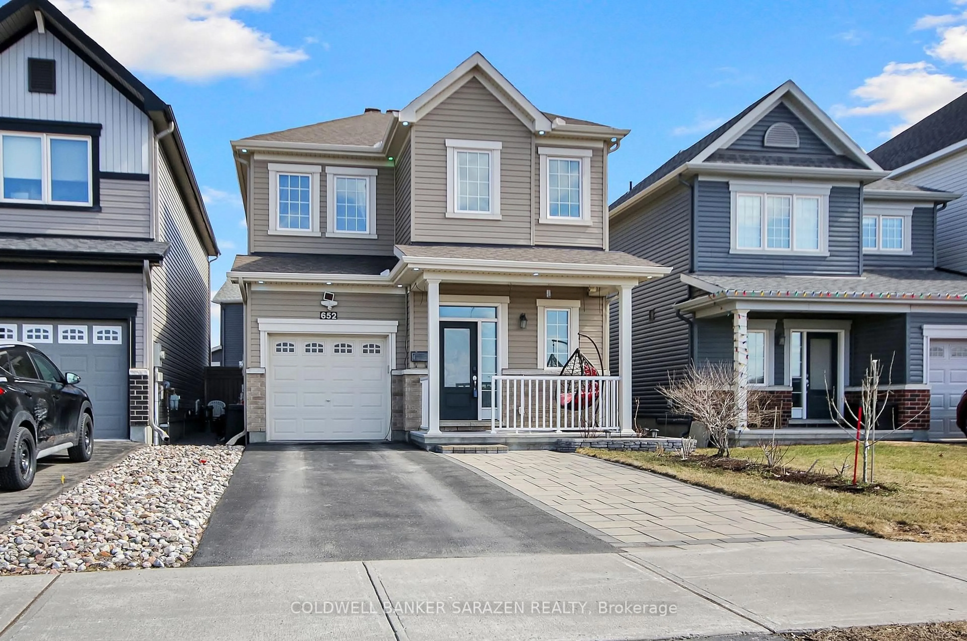 Home with vinyl exterior material, street for 652 Decoeur Dr, Orleans Ontario K4A 1G4