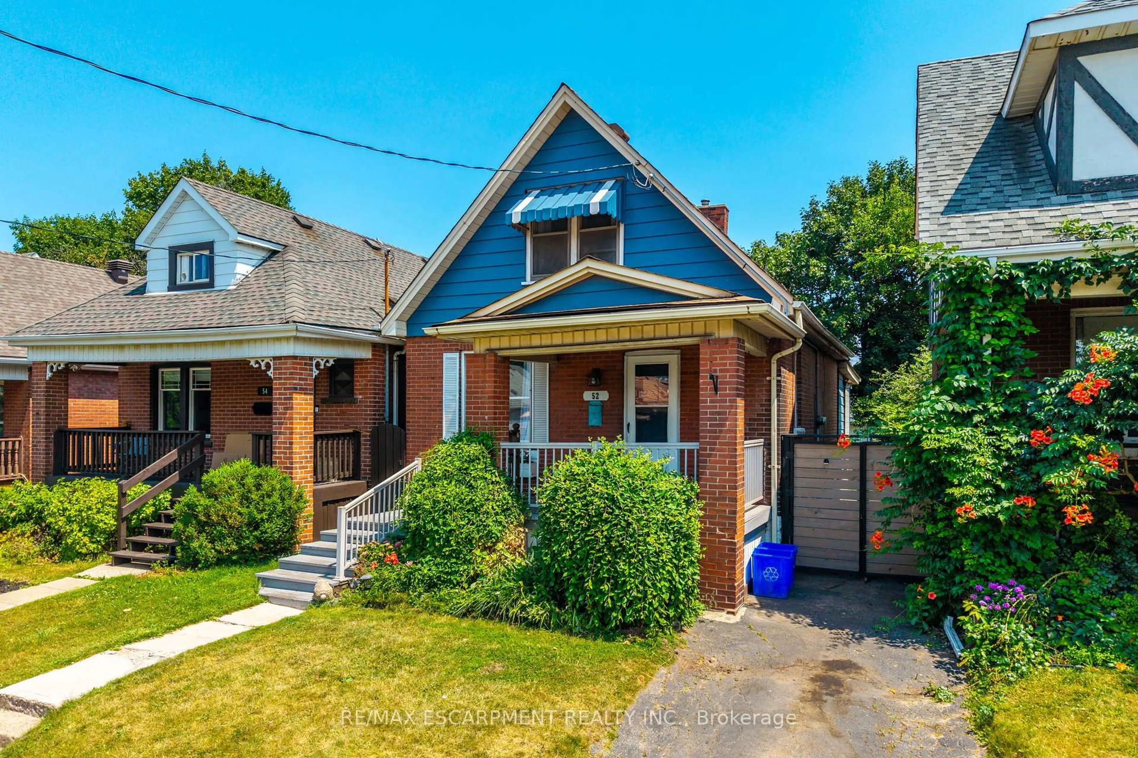 Home with brick exterior material, street for 52 Connaught Ave, Hamilton Ontario L8L 6Y8