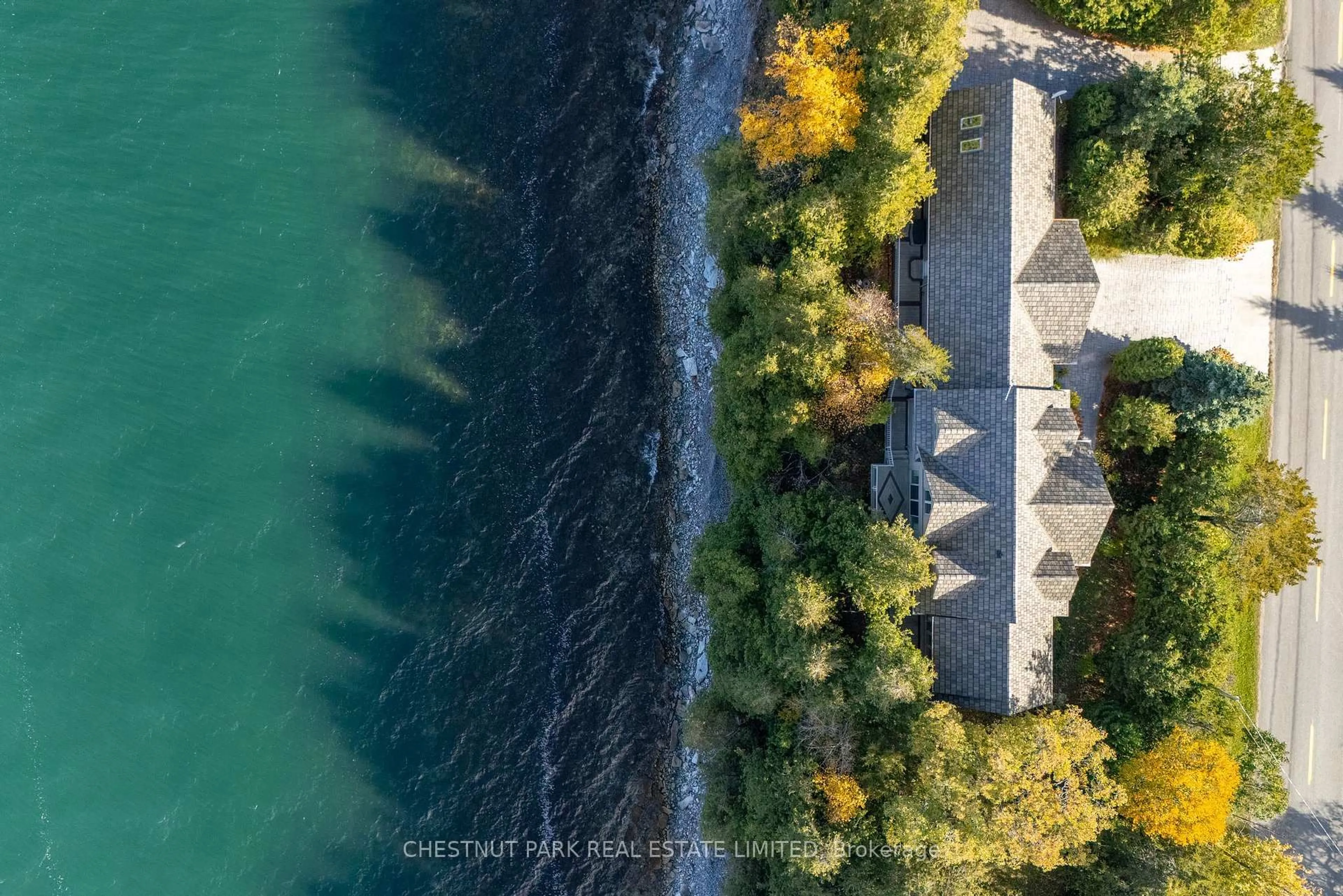 A pic from outside/outdoor area/front of a property/back of a property/a pic from drone, water/lake/river/ocean view for 3853 County Road 13, Prince Edward County Ontario K0K 2T0