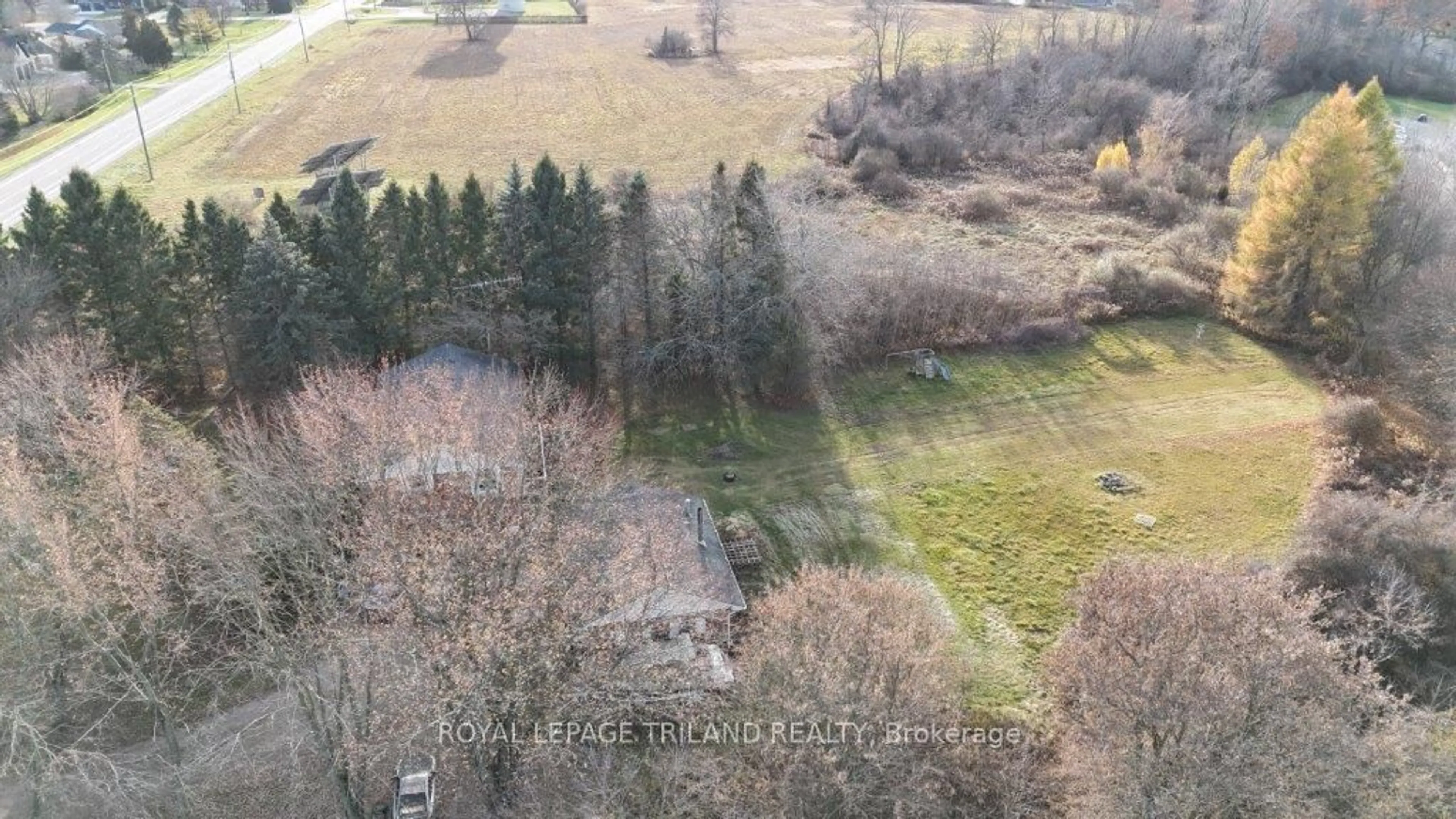 A pic from outside/outdoor area/front of a property/back of a property/a pic from drone, forest/trees view for 5069 East Rd, Central Elgin Ontario N0L 2L0