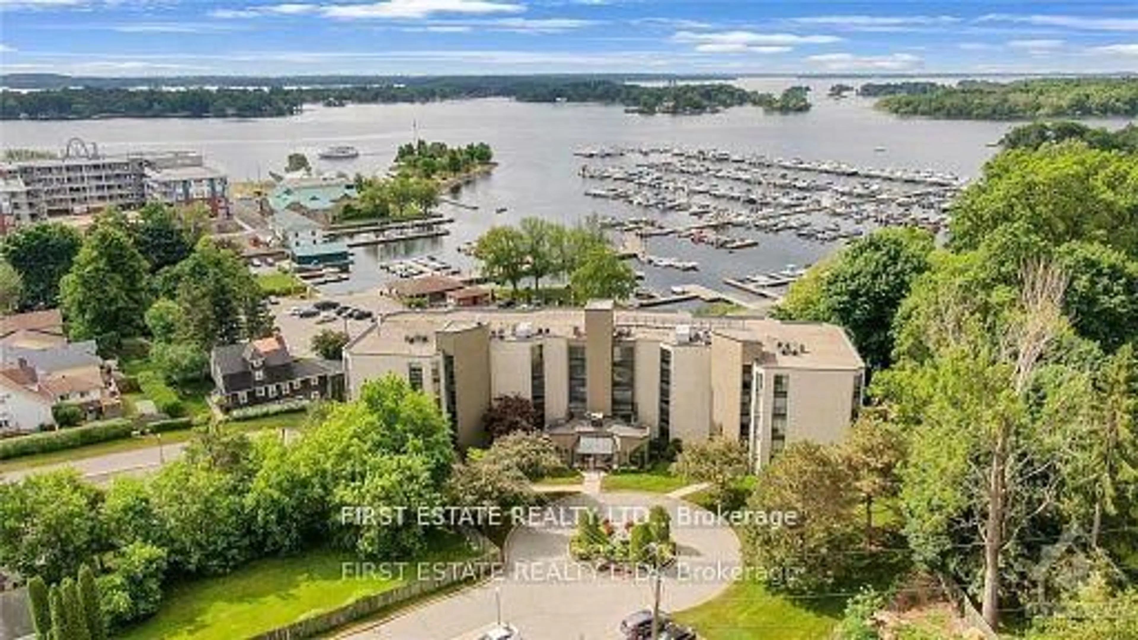 A pic from outside/outdoor area/front of a property/back of a property/a pic from drone, water/lake/river/ocean view for 50 MARKET St #203, Gananoque Ontario K7G 2M3