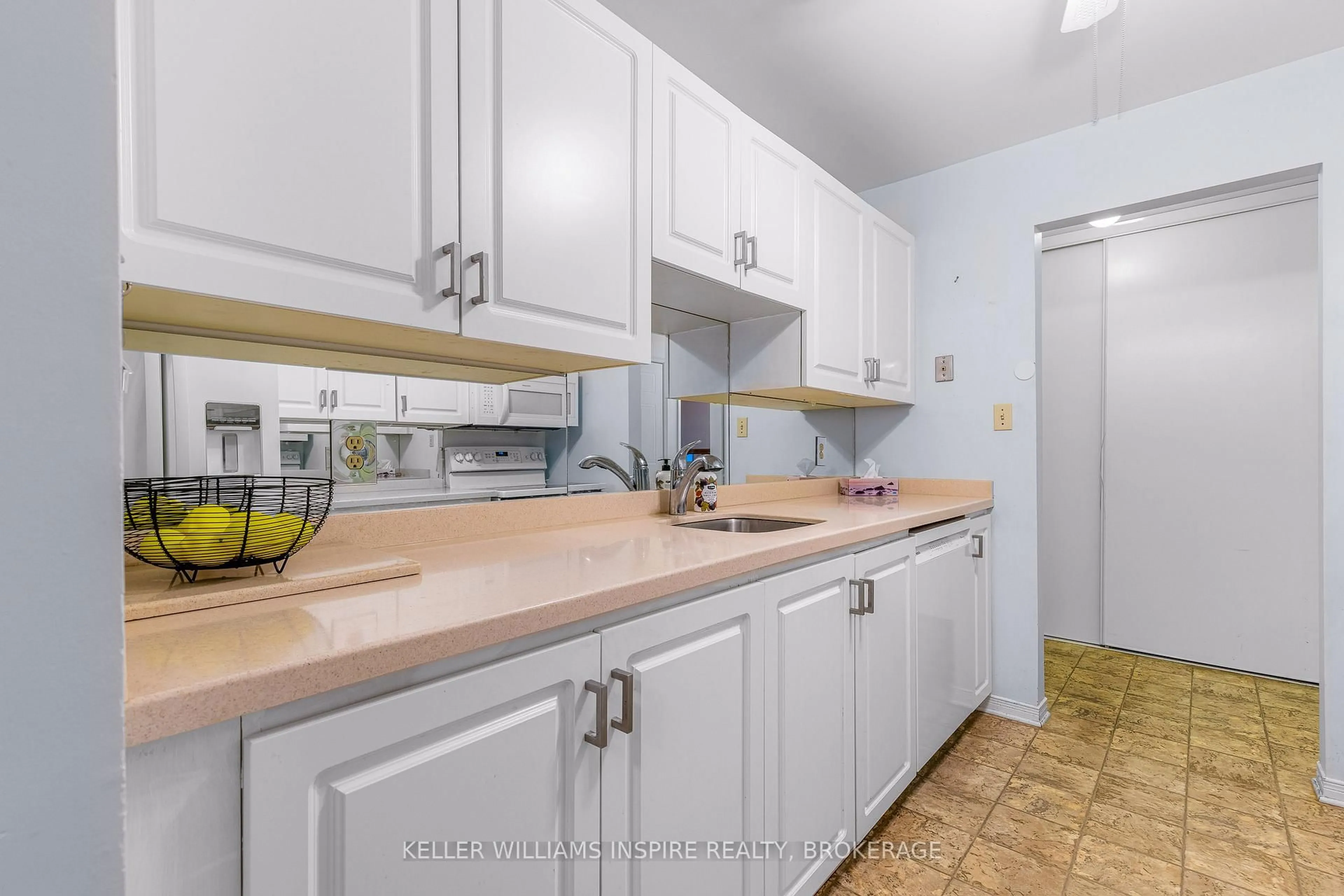 Standard kitchen, ceramic/tile floor for 1100 Millwood Ave #211, Brockville Ontario K6V 6Z3