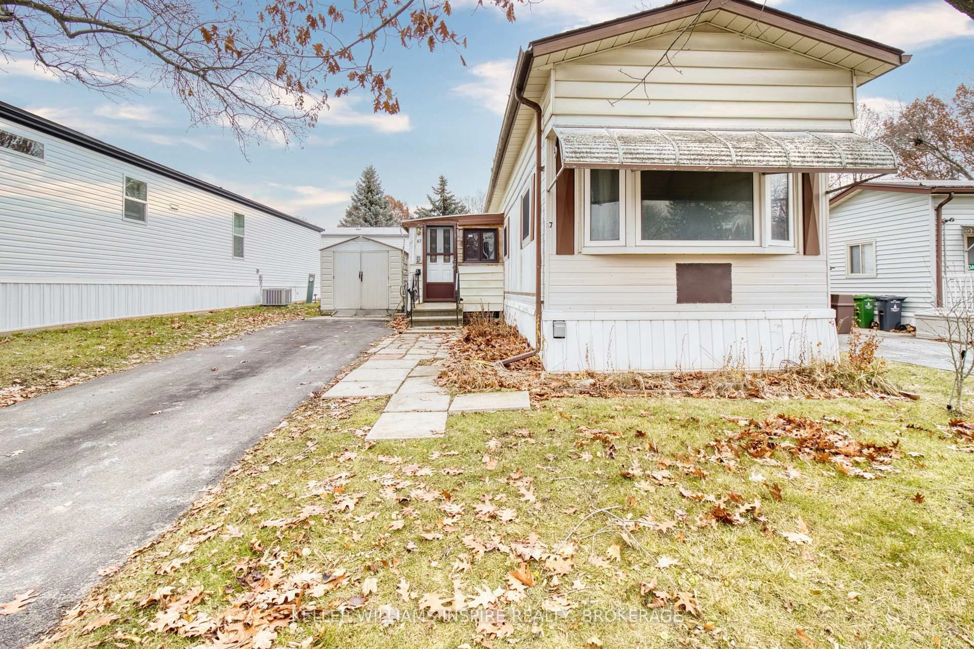 Home with vinyl exterior material, street for 67 Worthington Ave, Kingston Ontario K7P 2Y4