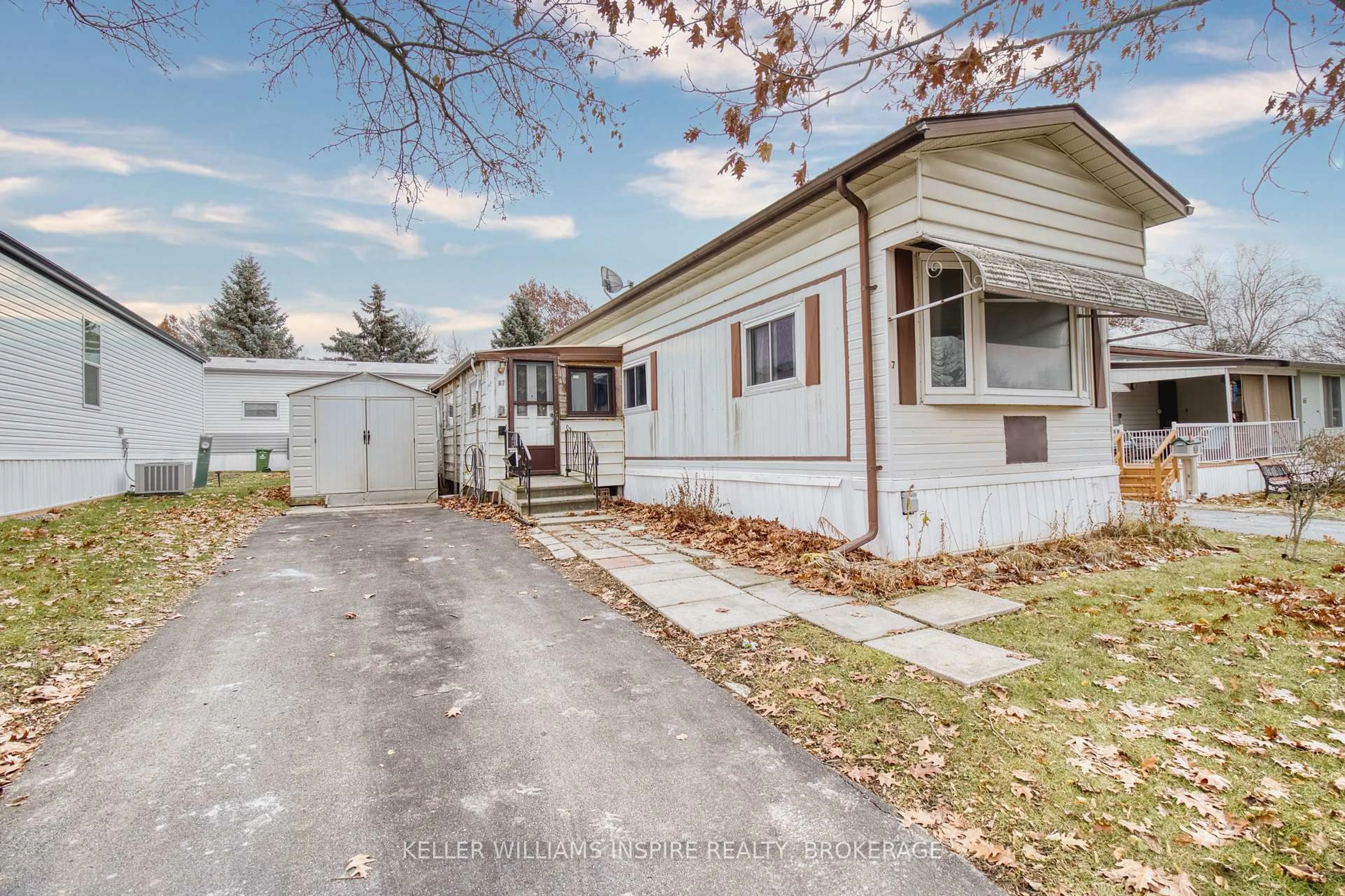 Home with vinyl exterior material, street for 67 Worthington Ave, Kingston Ontario K7P 2Y4