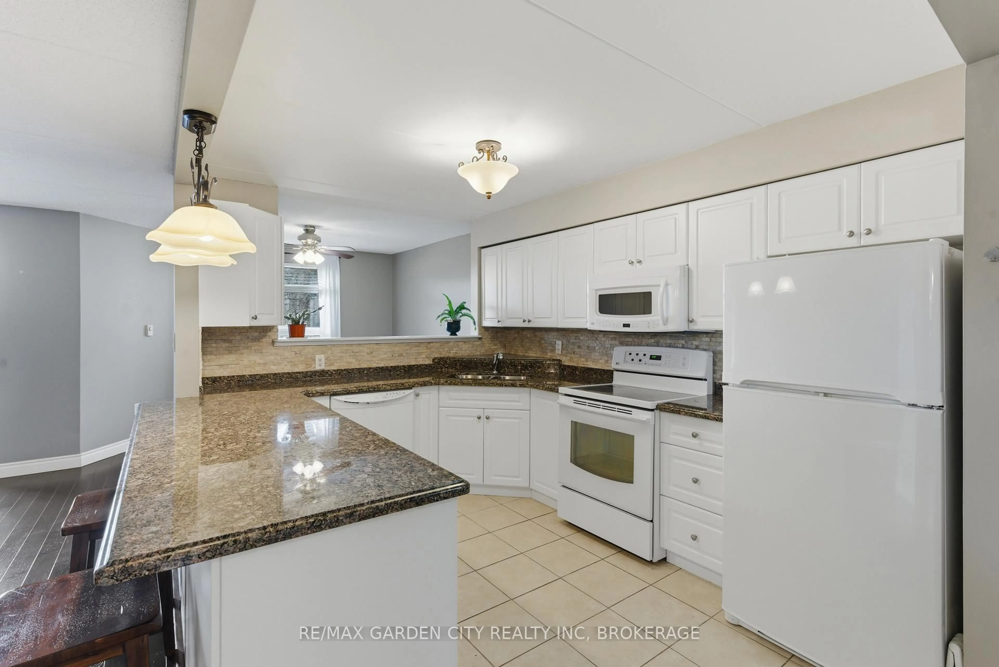 Standard kitchen, ceramic/tile floor for 4658 Drummond Rd #230, Niagara Falls Ontario L2E 7E1