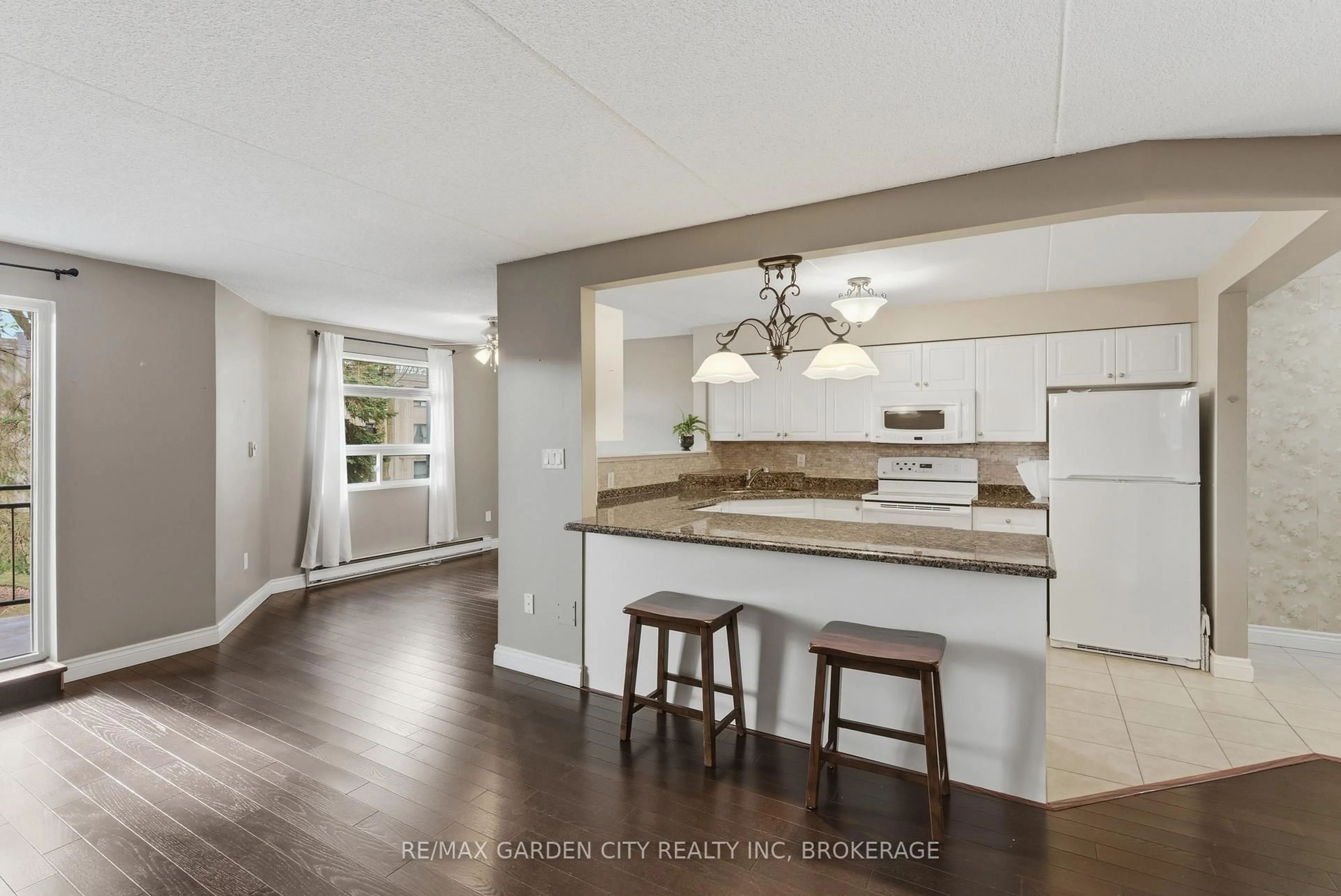 Open concept kitchen, unknown for 4658 Drummond Rd #230, Niagara Falls Ontario L2E 7E1