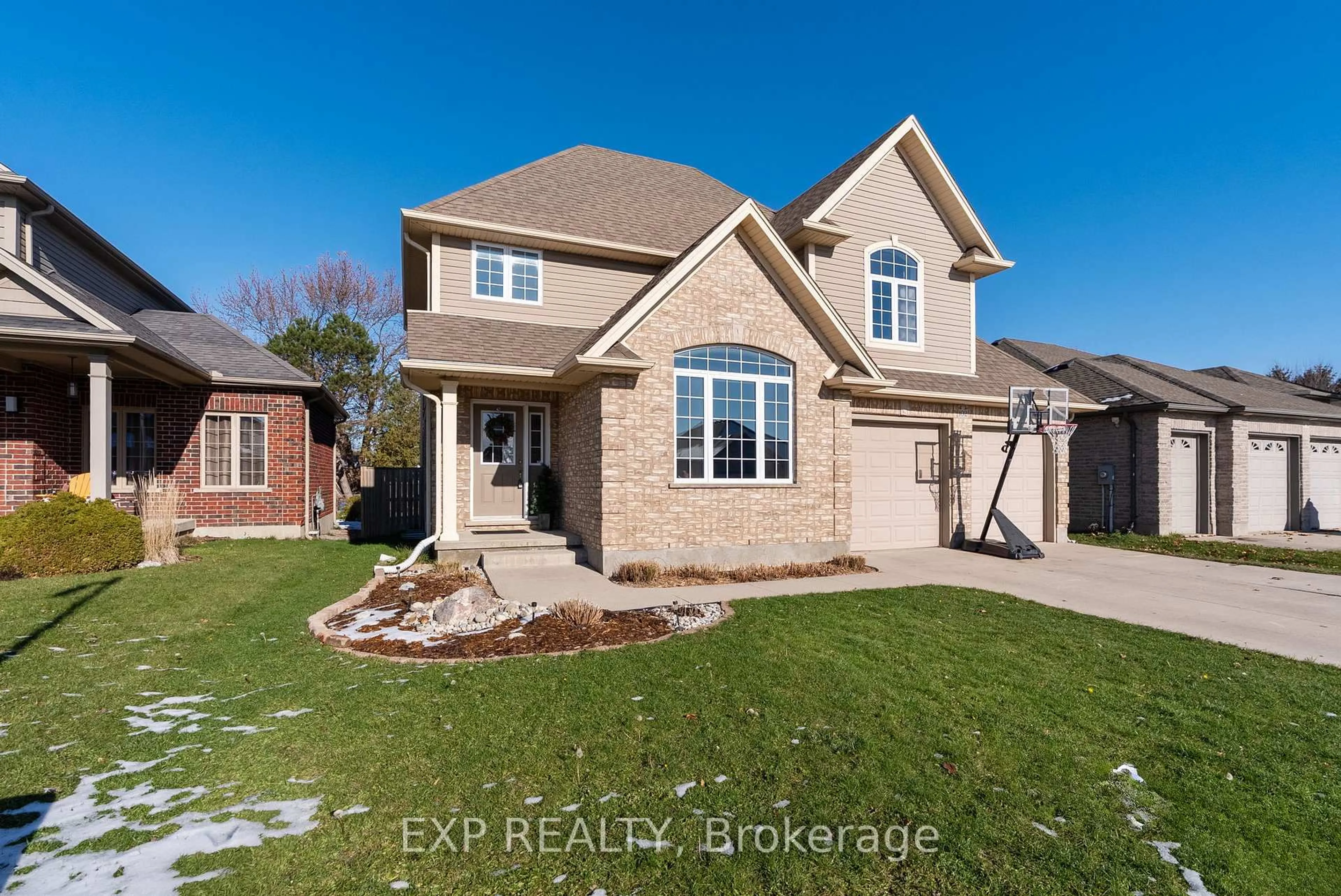 Home with brick exterior material, street for 102 Joseph St, Lucan Biddulph Ontario N0M 2J0