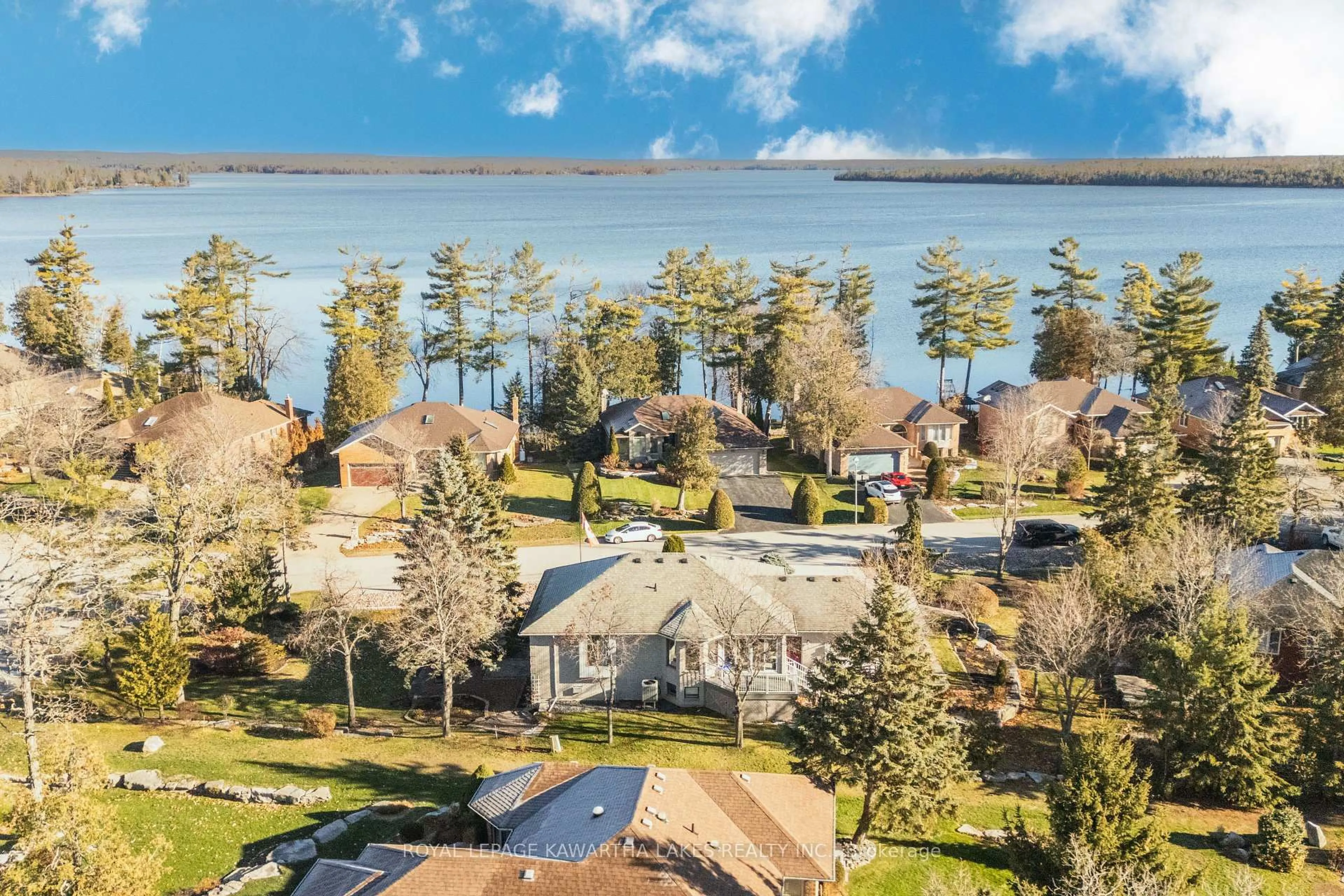 A pic from outside/outdoor area/front of a property/back of a property/a pic from drone, water/lake/river/ocean view for 83 Navigators Tr, Kawartha Lakes Ontario K0M 1A0