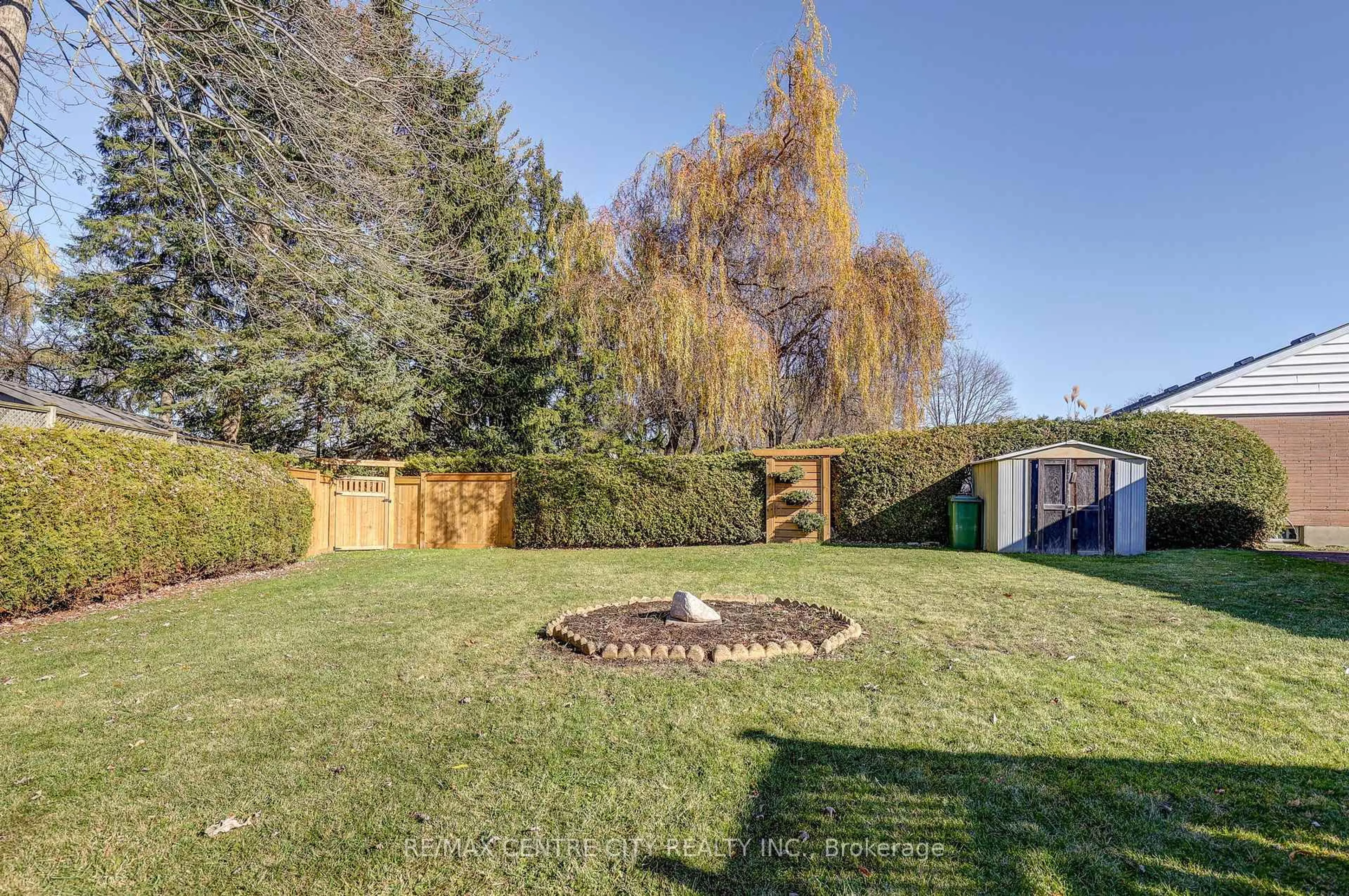 A pic from outside/outdoor area/front of a property/back of a property/a pic from drone, forest/trees view for 4 Brant Ave, St. Thomas Ontario N5R 1Z4