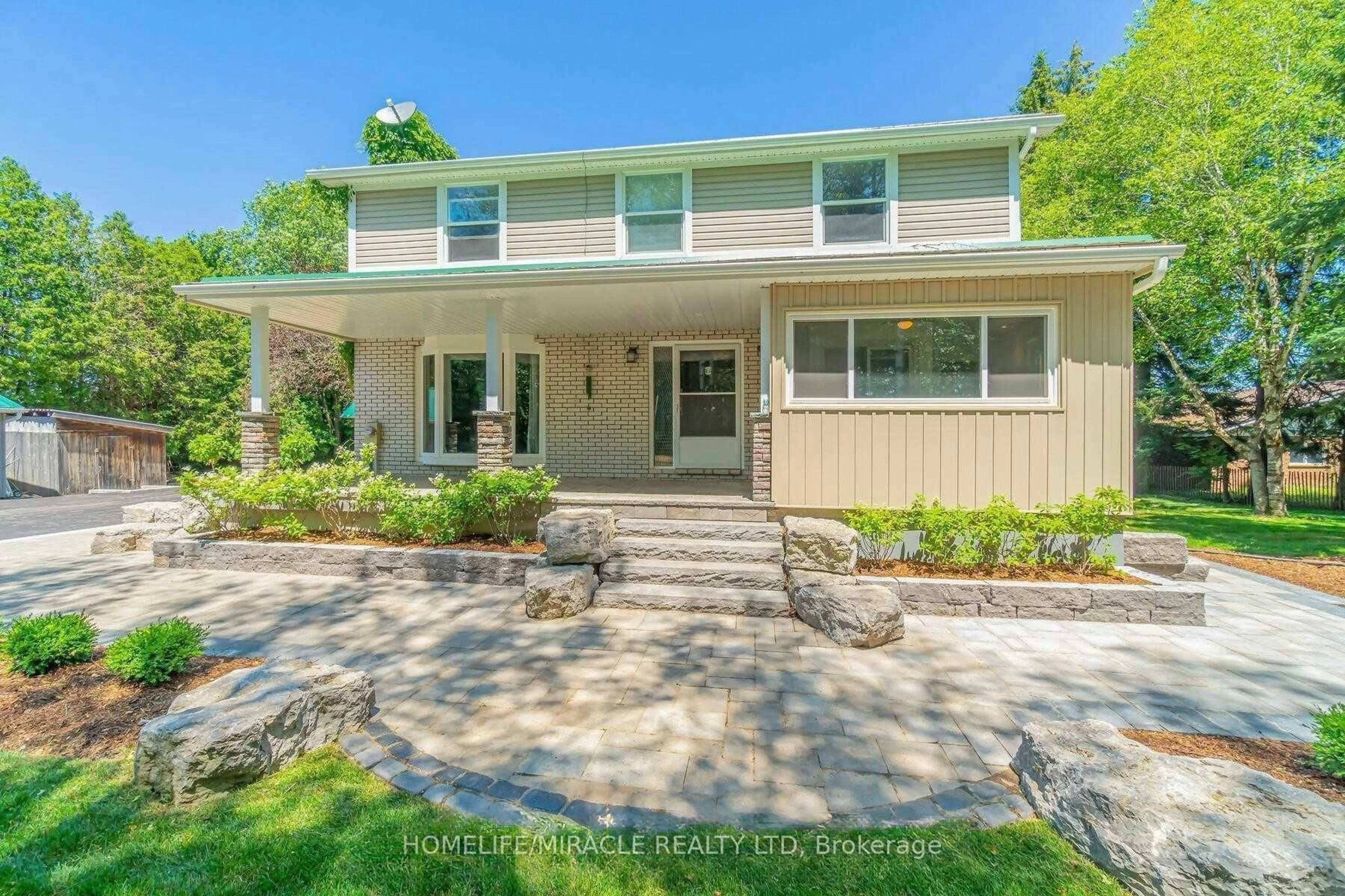 Home with vinyl exterior material, street for 5607 Tenth Line, Erin Ontario N0B 1T0