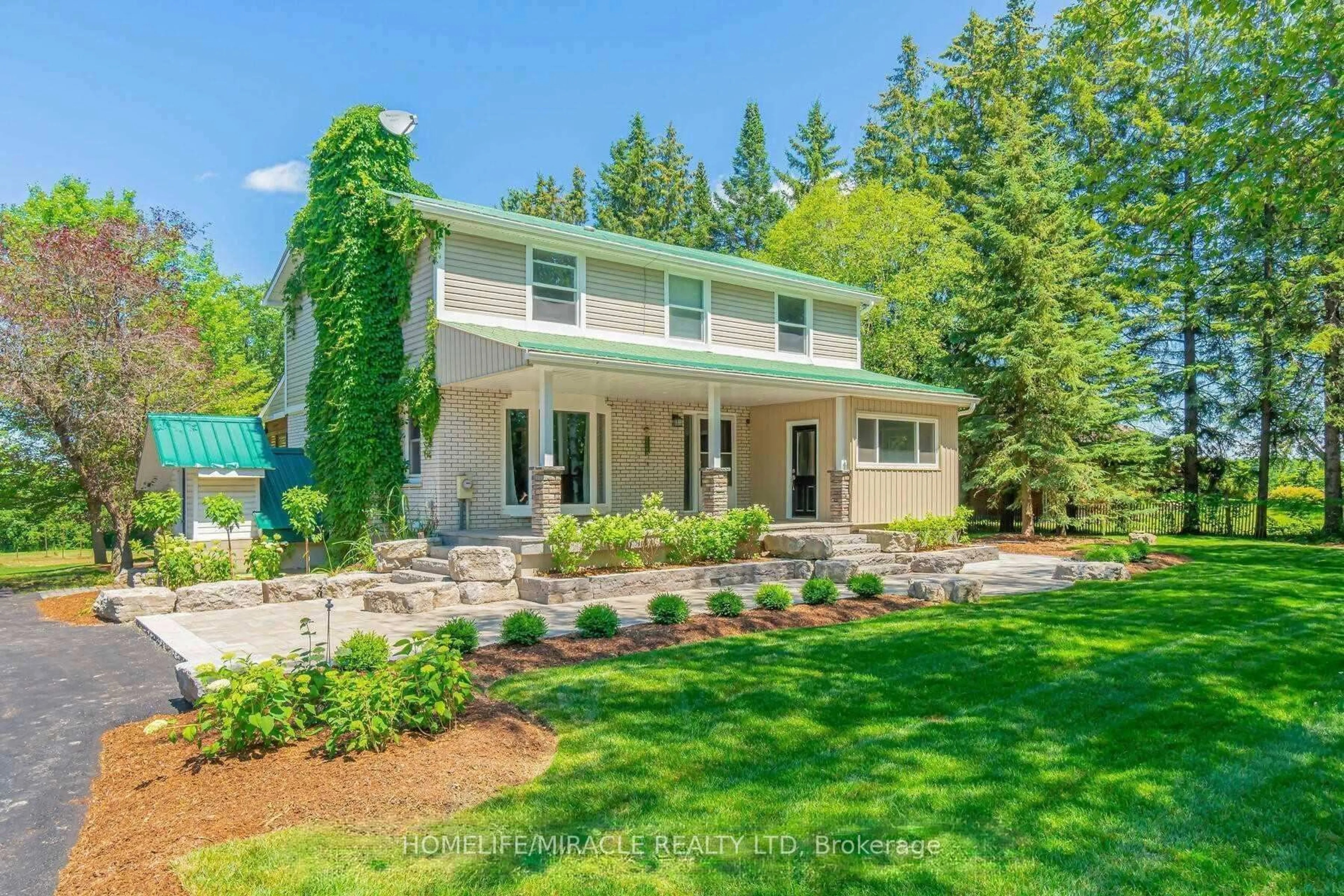 Home with vinyl exterior material, street for 5607 Tenth Line, Erin Ontario N0B 1T0