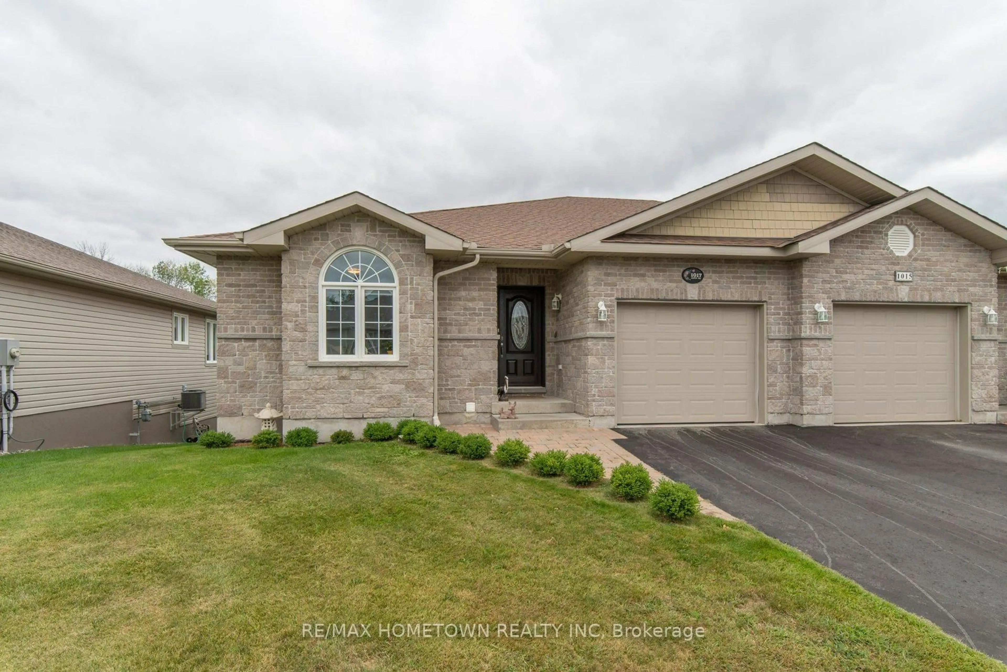 Home with brick exterior material, street for 1017 Aspen Dr, Brockville Ontario K6V 7G2