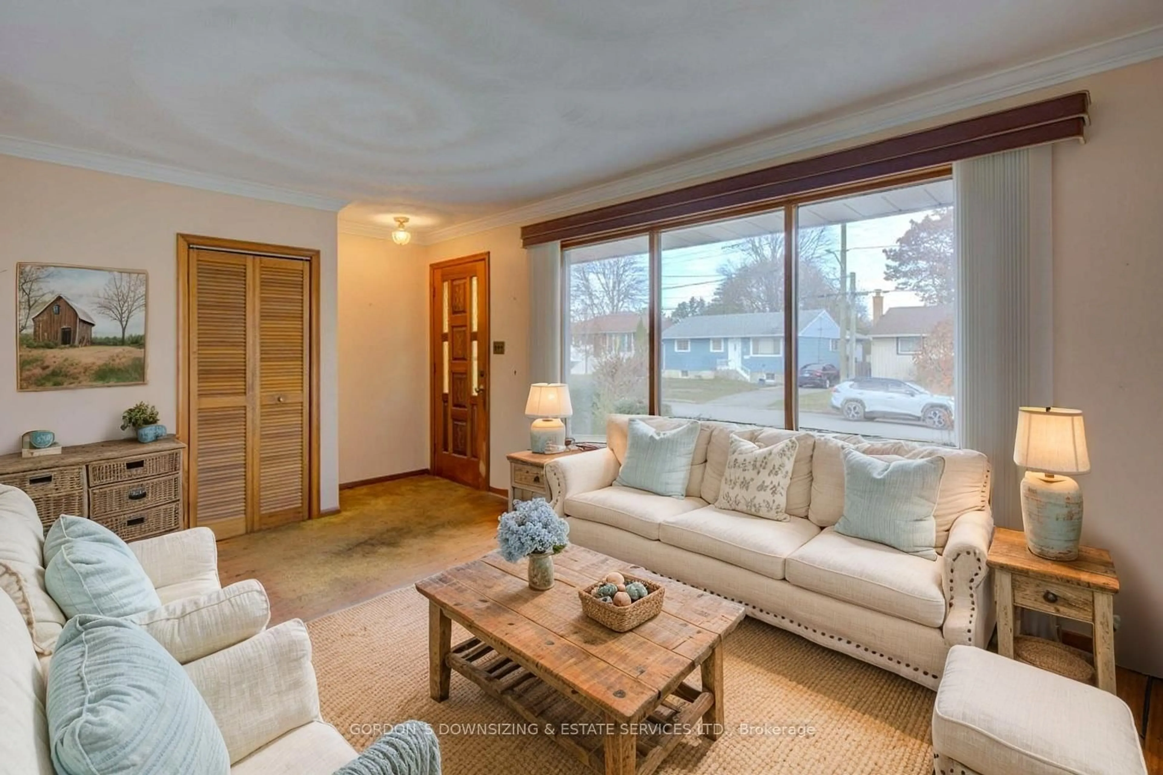 Living room with furniture, wood/laminate floor for 34 Elizabeth Ave, Quinte West Ontario K8V 2R2