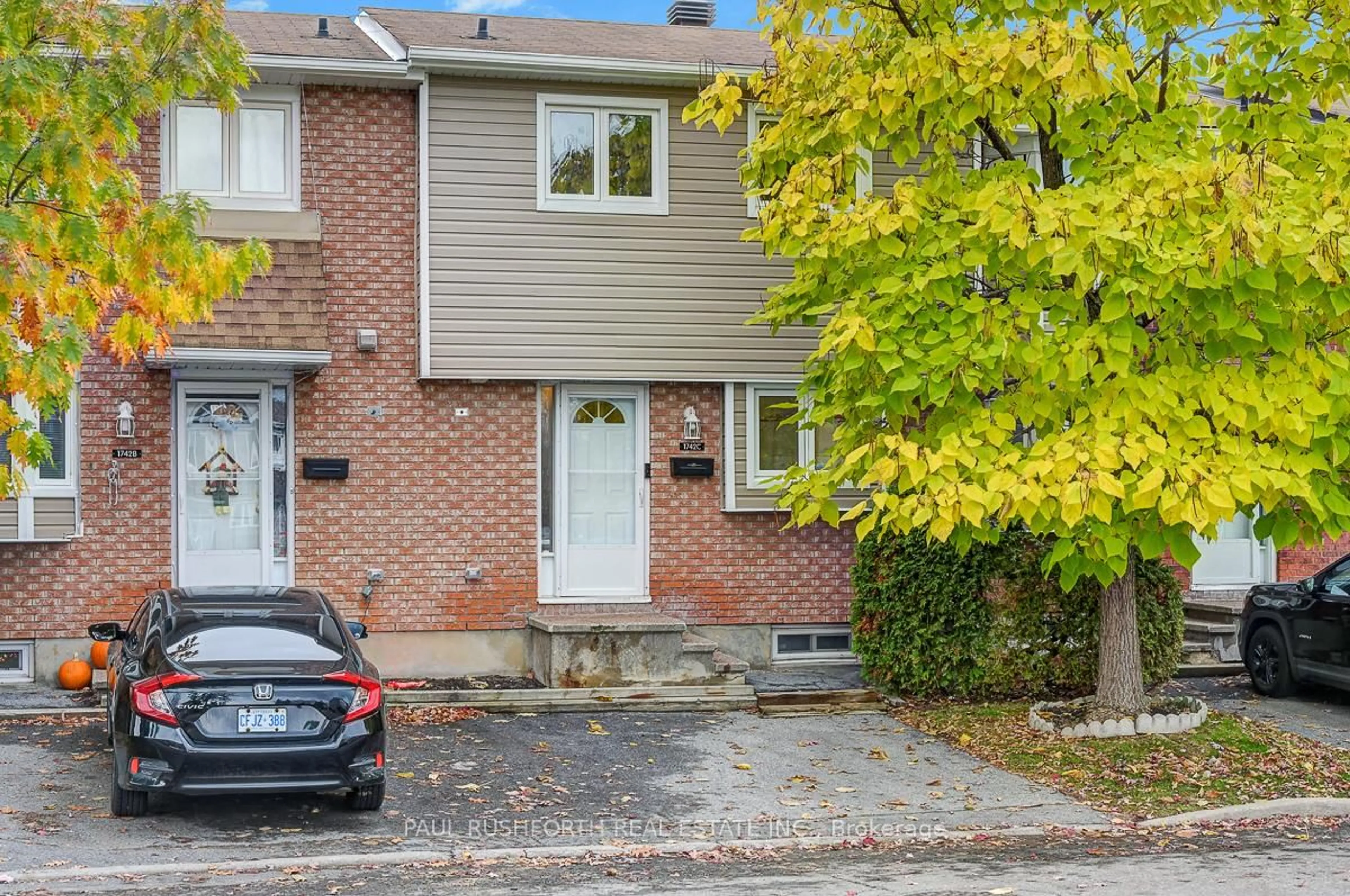 Home with brick exterior material, street for 1742 Lamoureux Dr #C, Orleans Ontario K1E 2N2