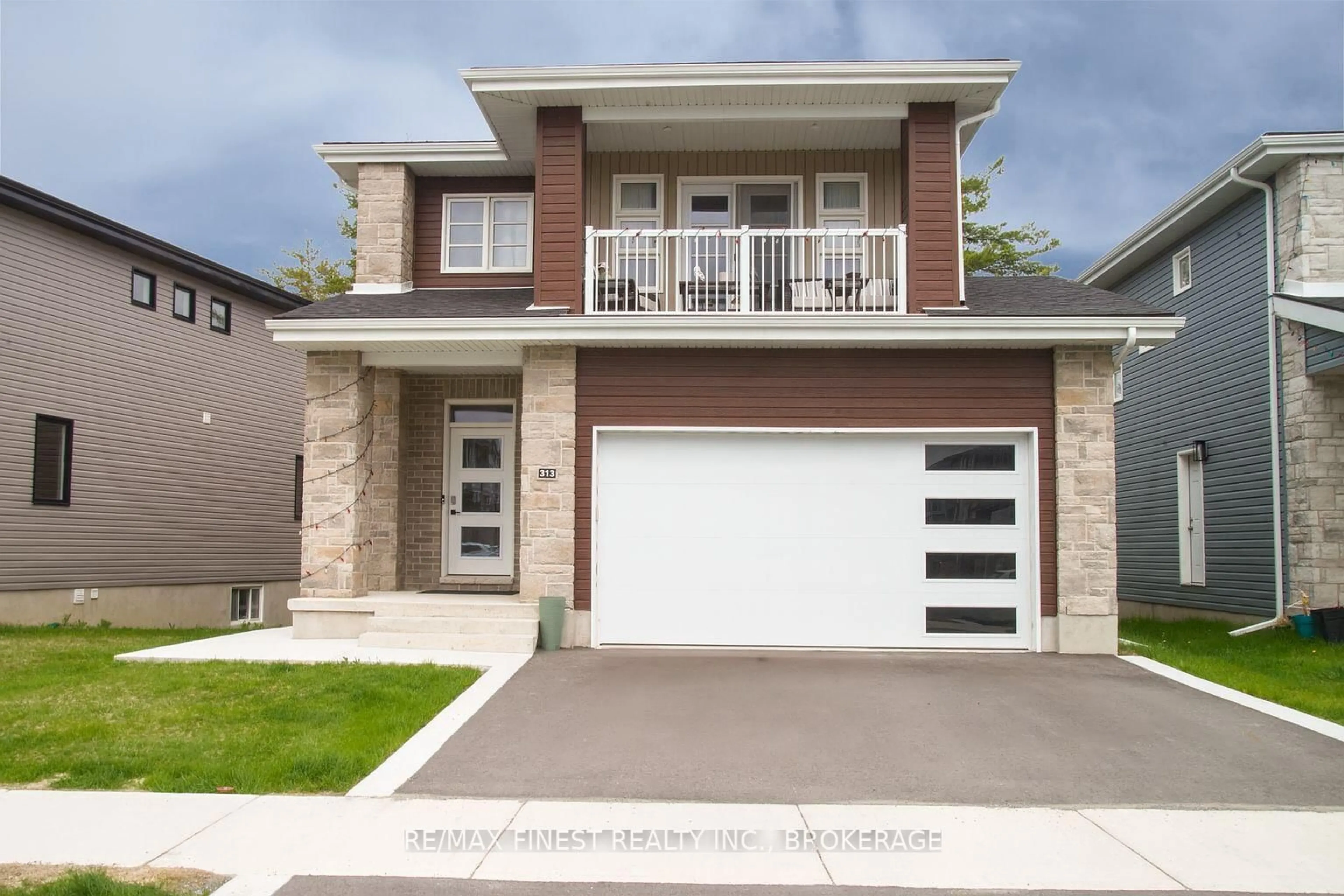 Home with brick exterior material, street for 313 Pratt Dr, Loyalist Ontario K7N 0E8