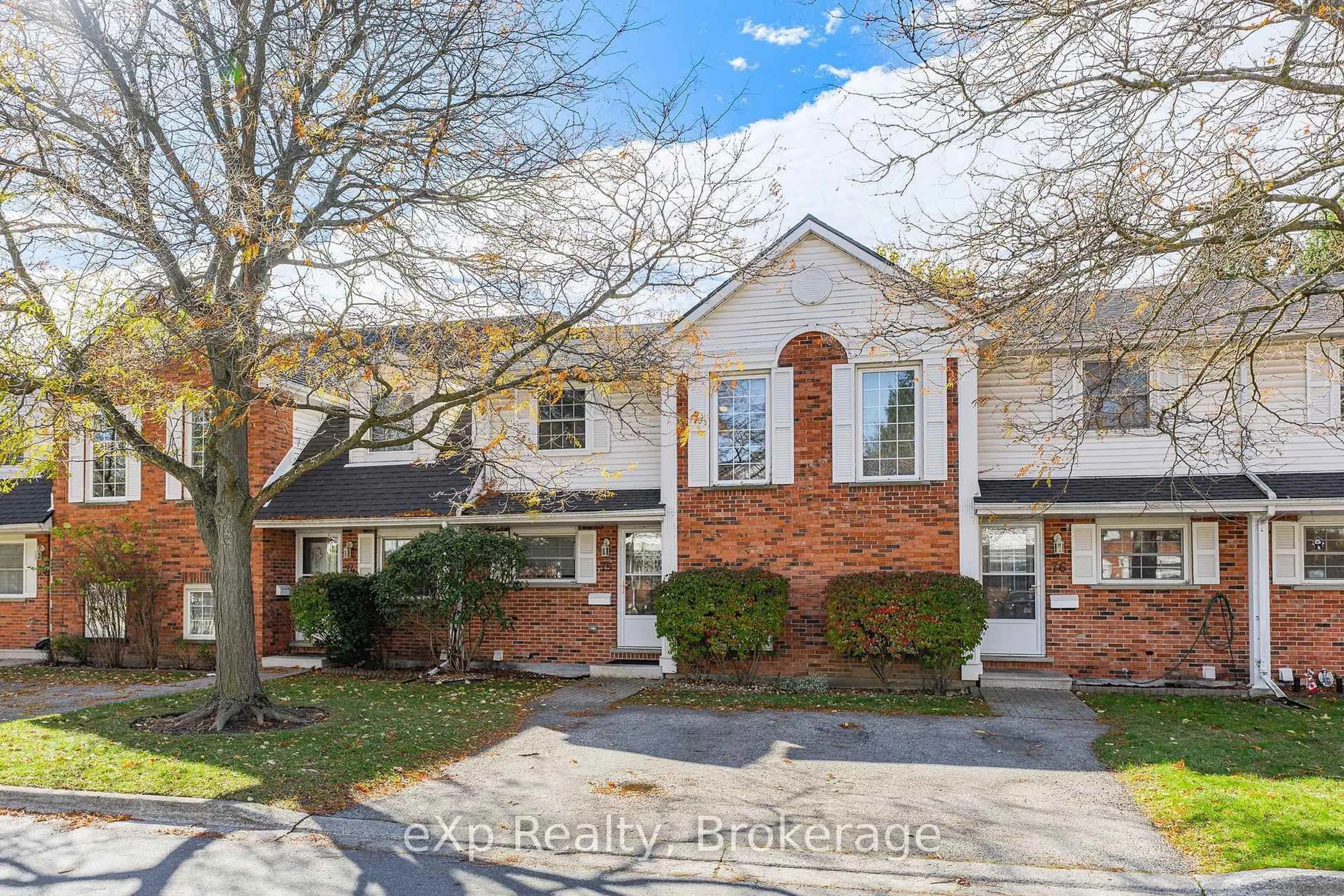 Home with brick exterior material, street for 129 Victoria Rd #75, Guelph Ontario N1E 6V4