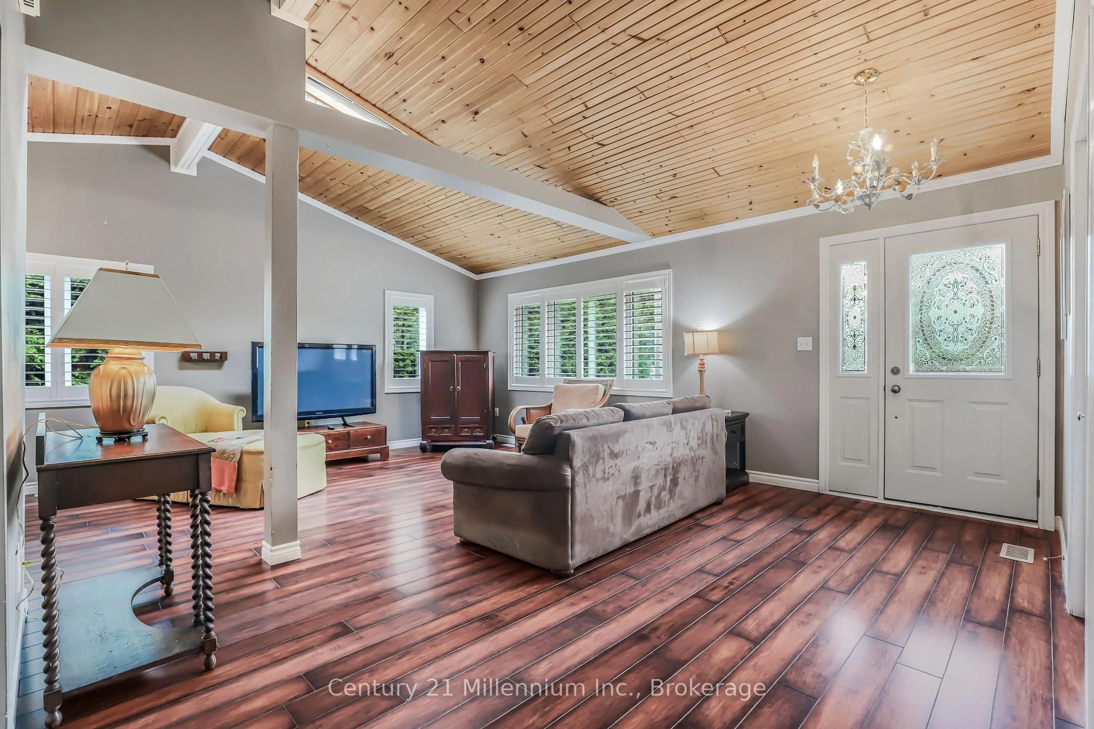 Living room with furniture, wood/laminate floor for 359 High St, Saugeen Shores Ontario N0H 2L0