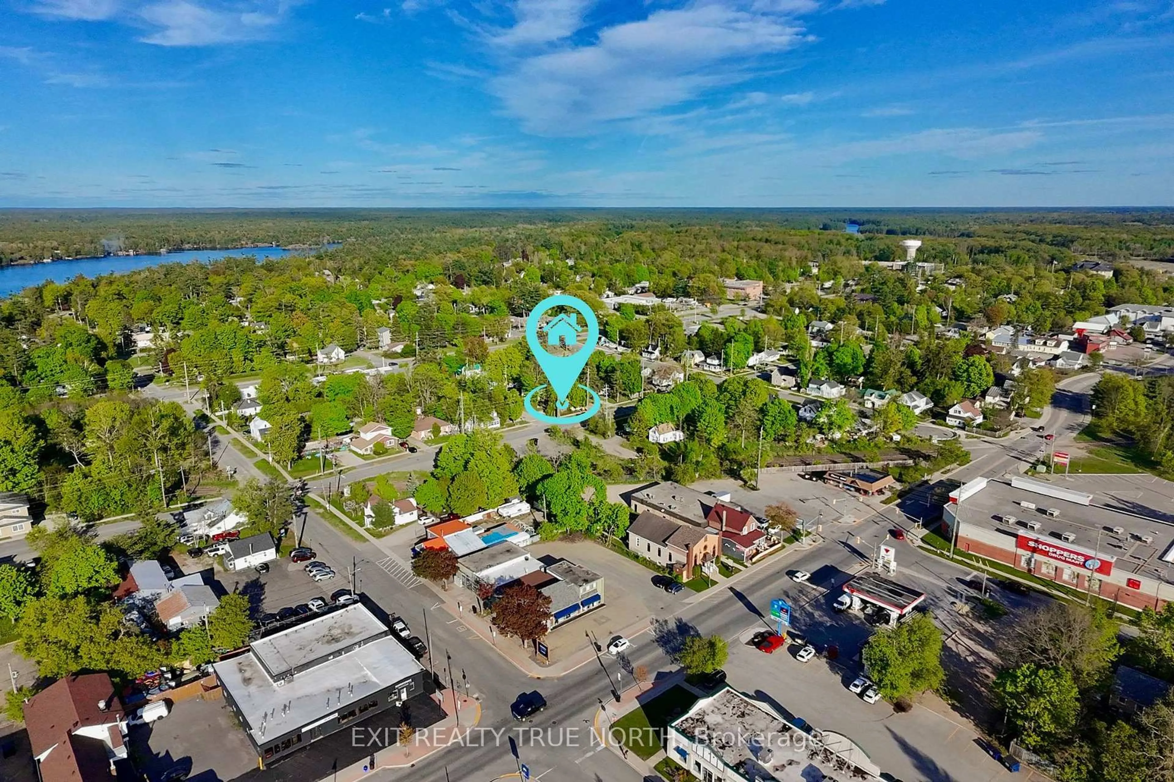 A pic from outside/outdoor area/front of a property/back of a property/a pic from drone, water/lake/river/ocean view for 211 Bishop St, Gravenhurst Ontario P1P 1J5
