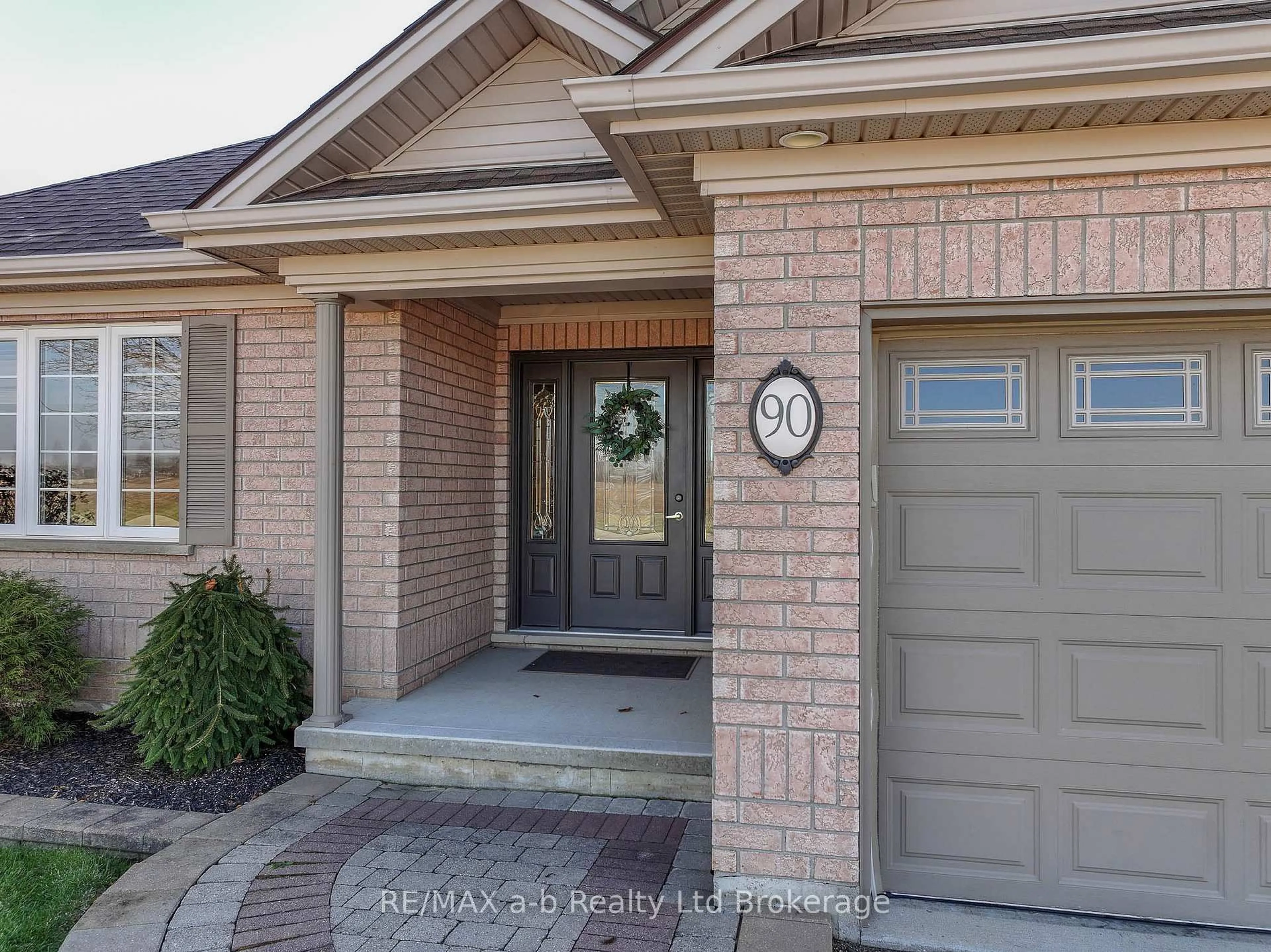 Home with brick exterior material, street for 90 WESTON Dr, Tillsonburg Ontario N4G 5W9