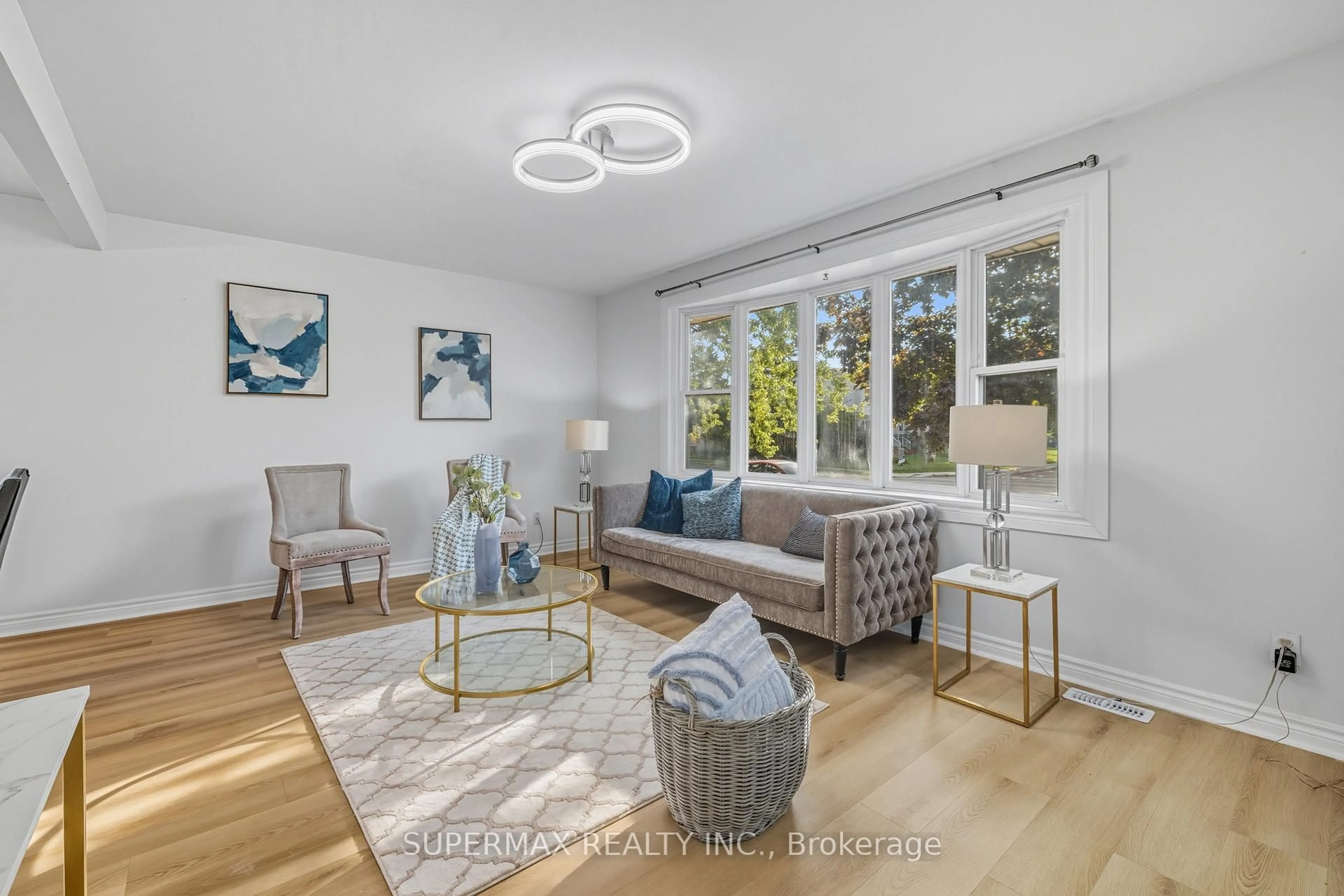 Living room with furniture, wood/laminate floor for 213 Highview Dr, St. Thomas Ontario N5R 5H6