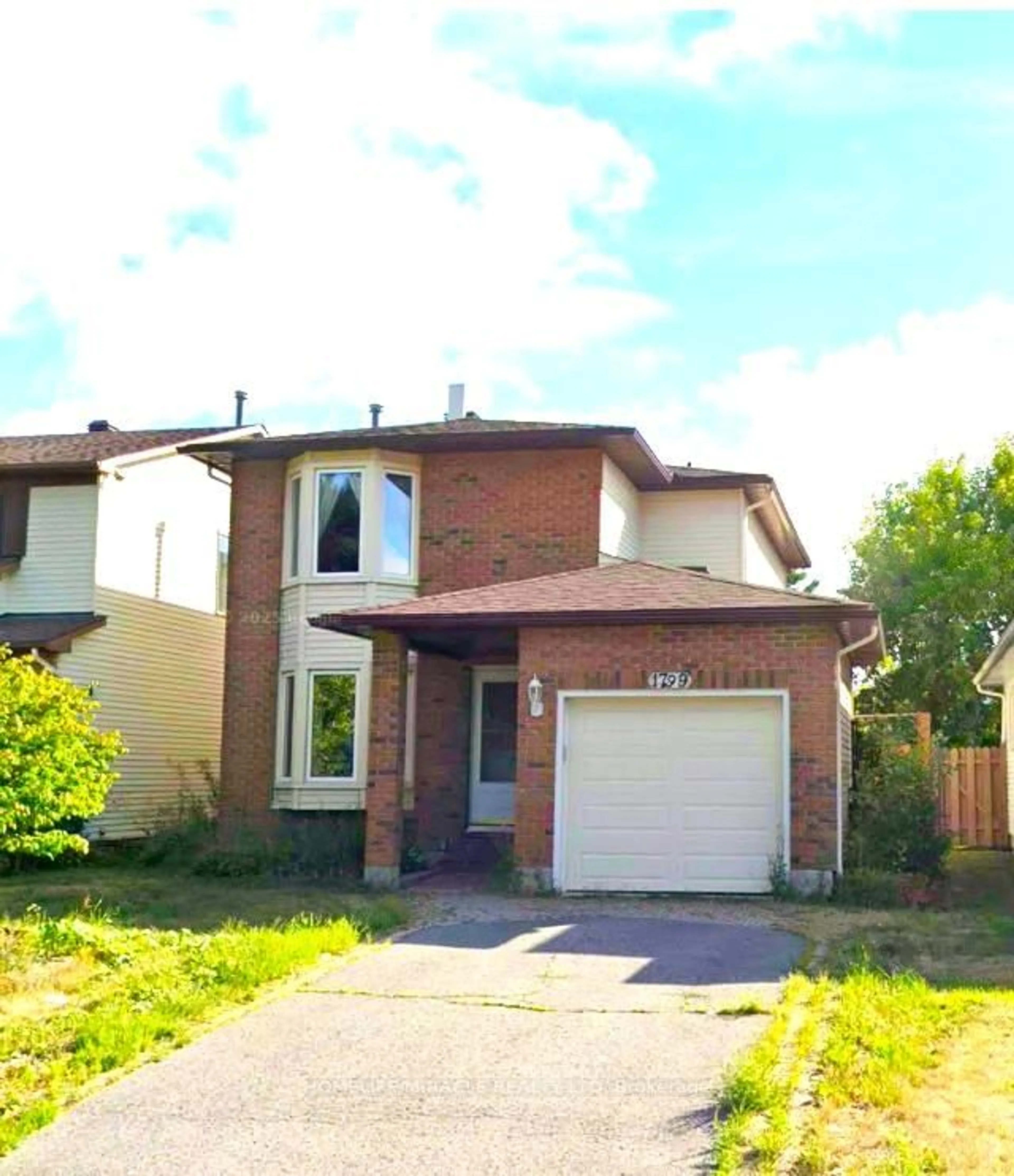 Home with brick exterior material, street for 1799 Bromont Way, Ottawa Ontario K1C 5H9