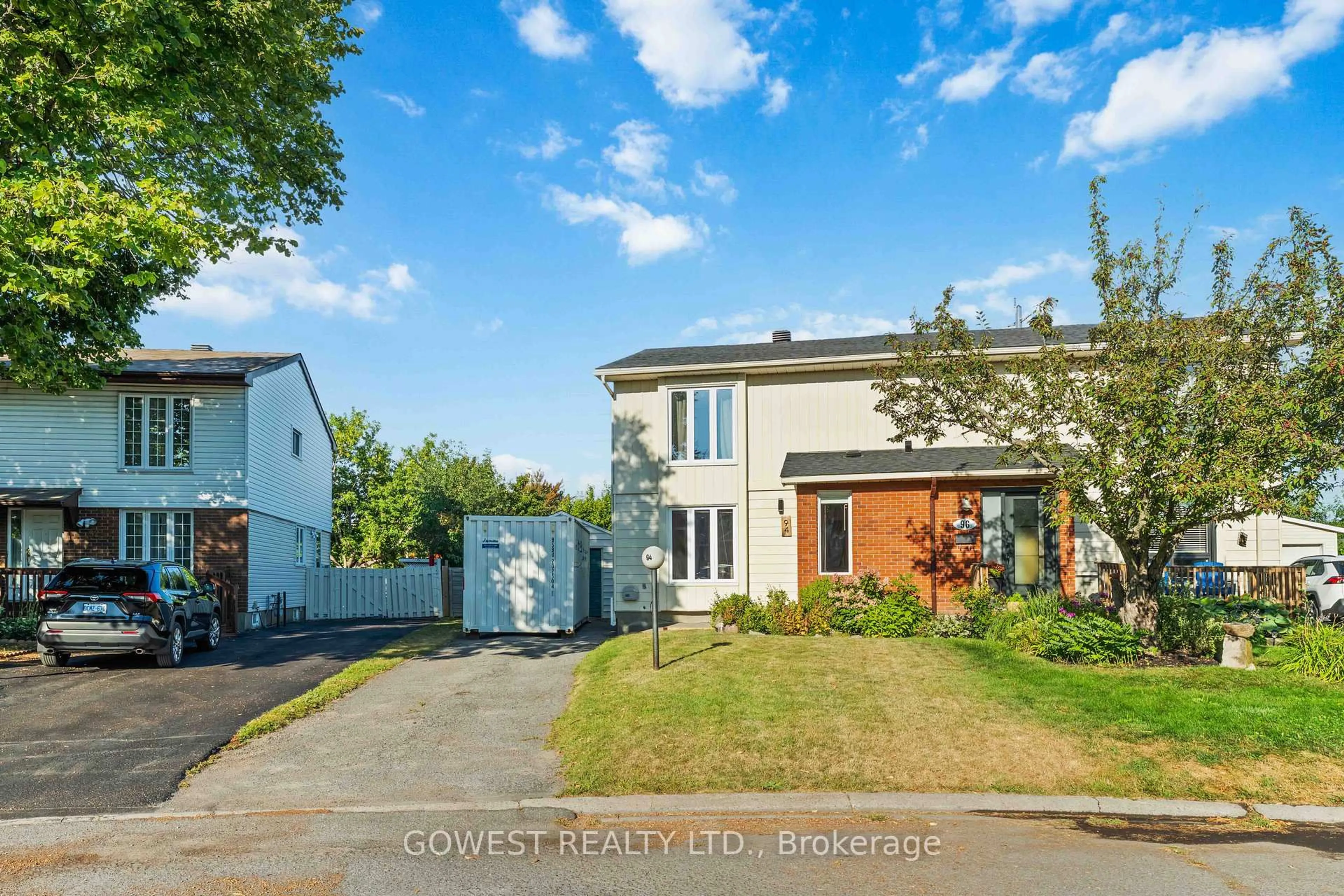 Home with brick exterior material, street for 94 Fieldgate Dr, Ottawa Ontario K2J 1T9