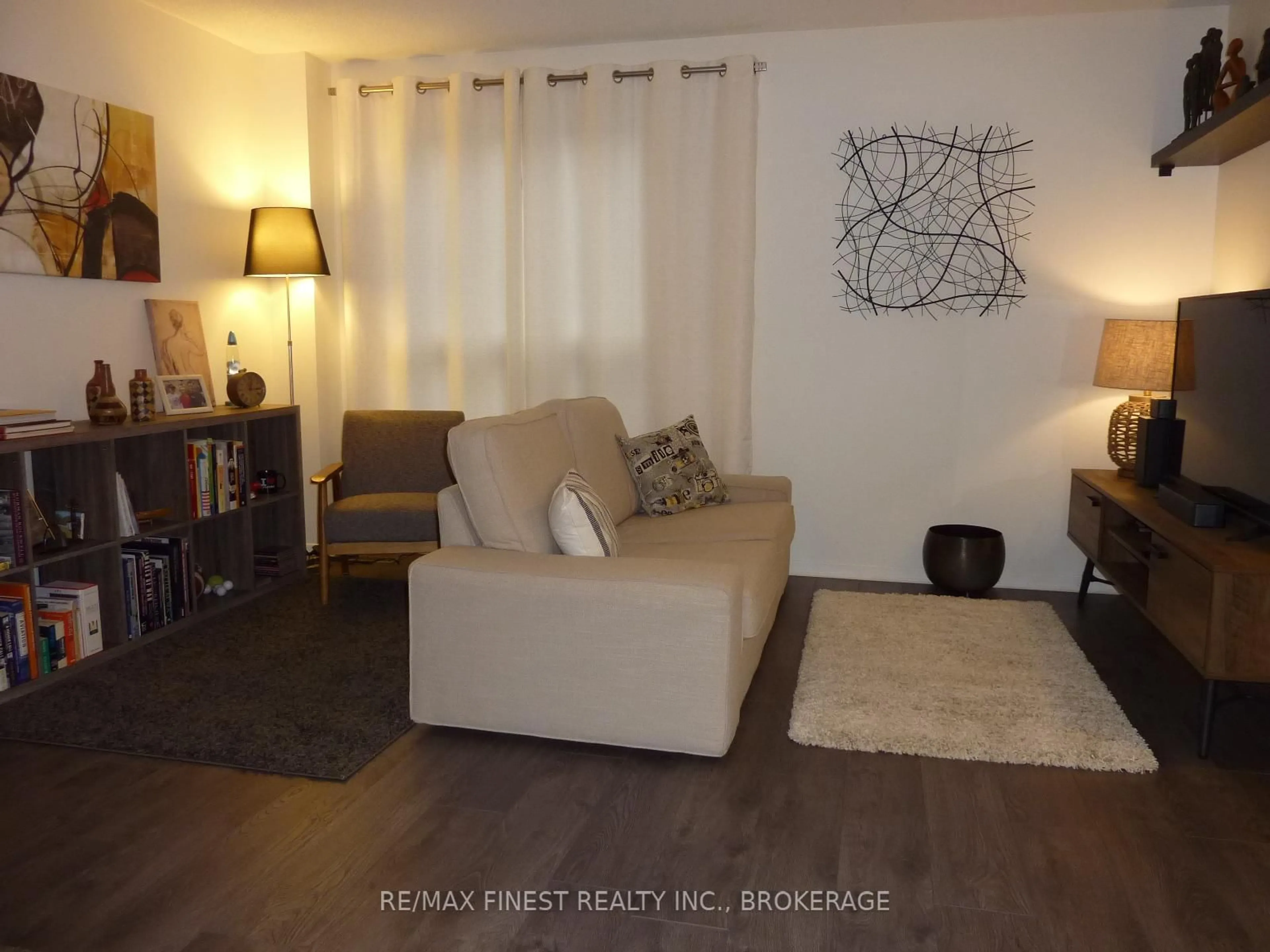 Living room with furniture, wood/laminate floor for 1081 Craig Lane, Kingston Ontario K7M 7R3