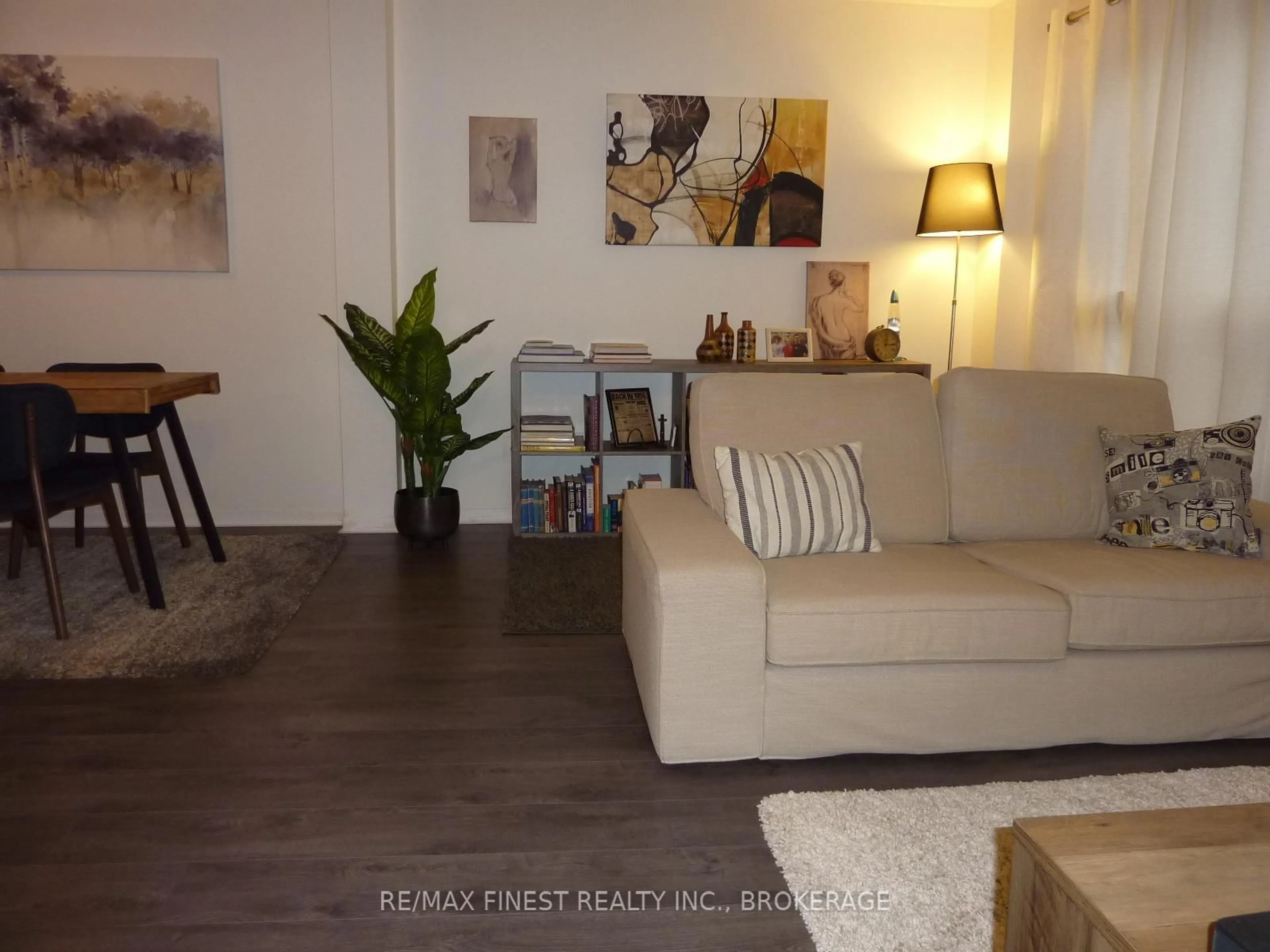 Living room with furniture, wood/laminate floor for 1081 Craig Lane, Kingston Ontario K7M 7R3