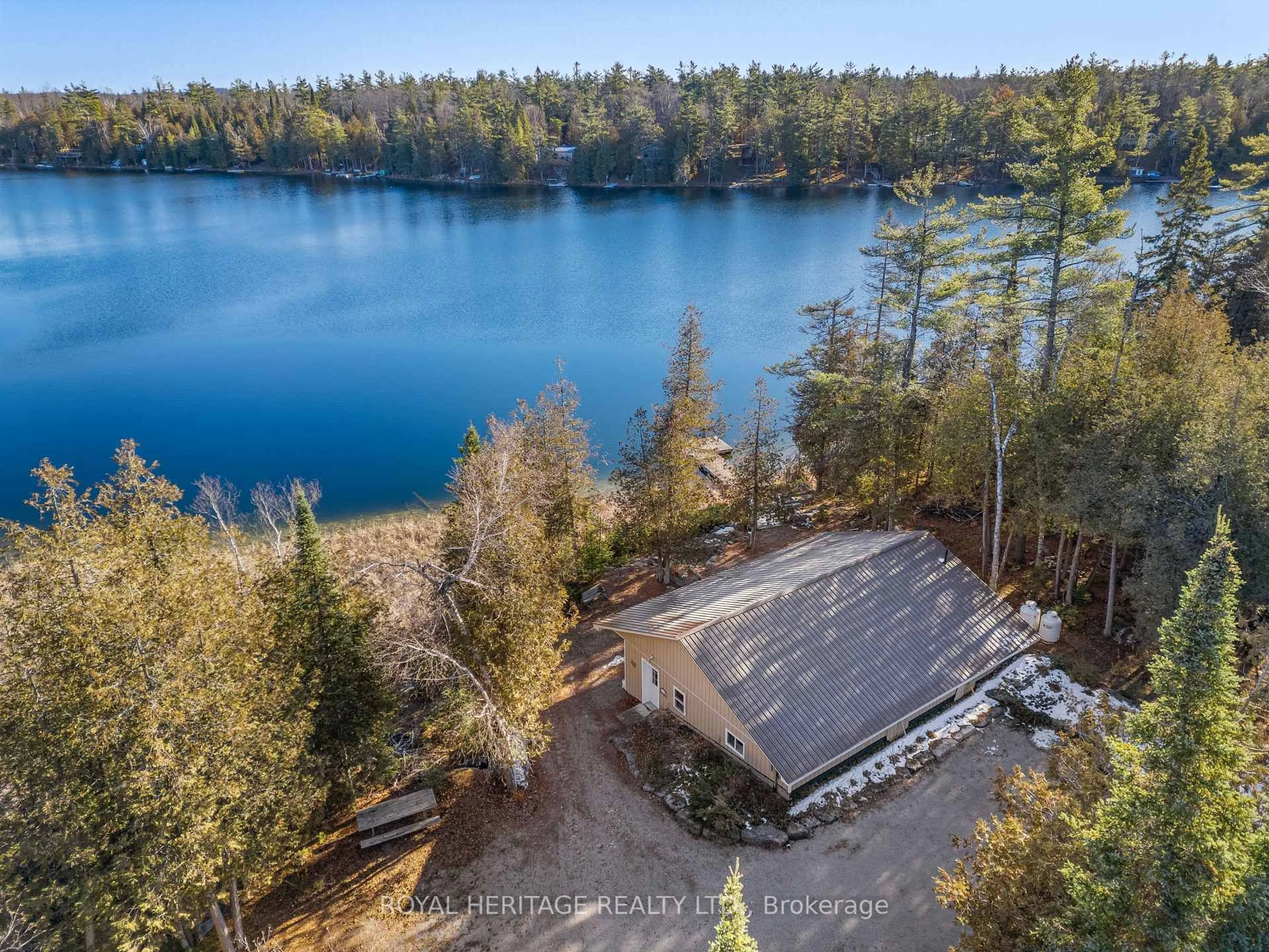 A pic from outside/outdoor area/front of a property/back of a property/a pic from drone, water/lake/river/ocean view for 1330 County Rd 49 Rd, Kawartha Lakes Ontario K0M 1A0