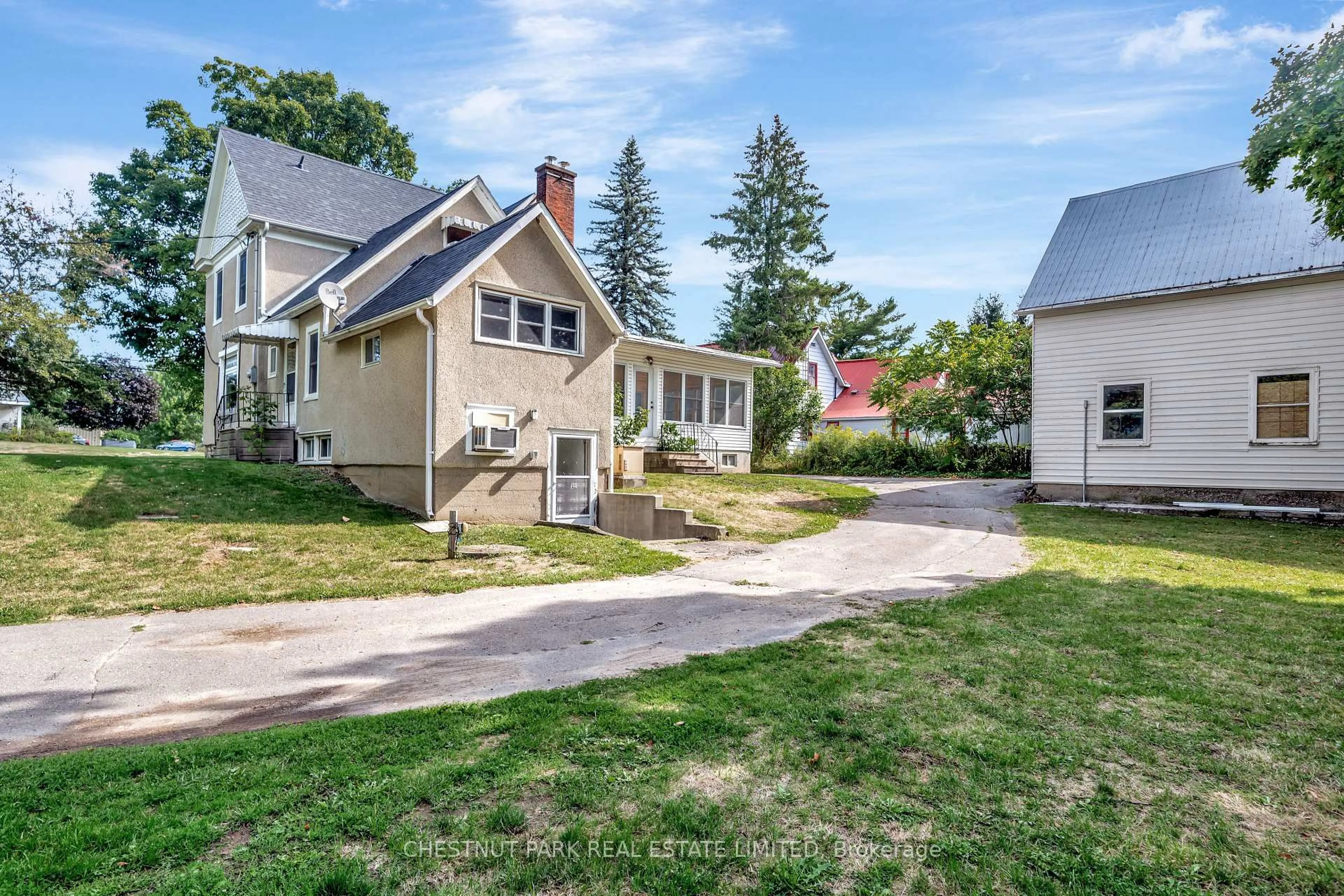 A pic from outside/outdoor area/front of a property/back of a property/a pic from drone, street for 385 Bloomfield Main St, Prince Edward County Ontario K0K 1G0