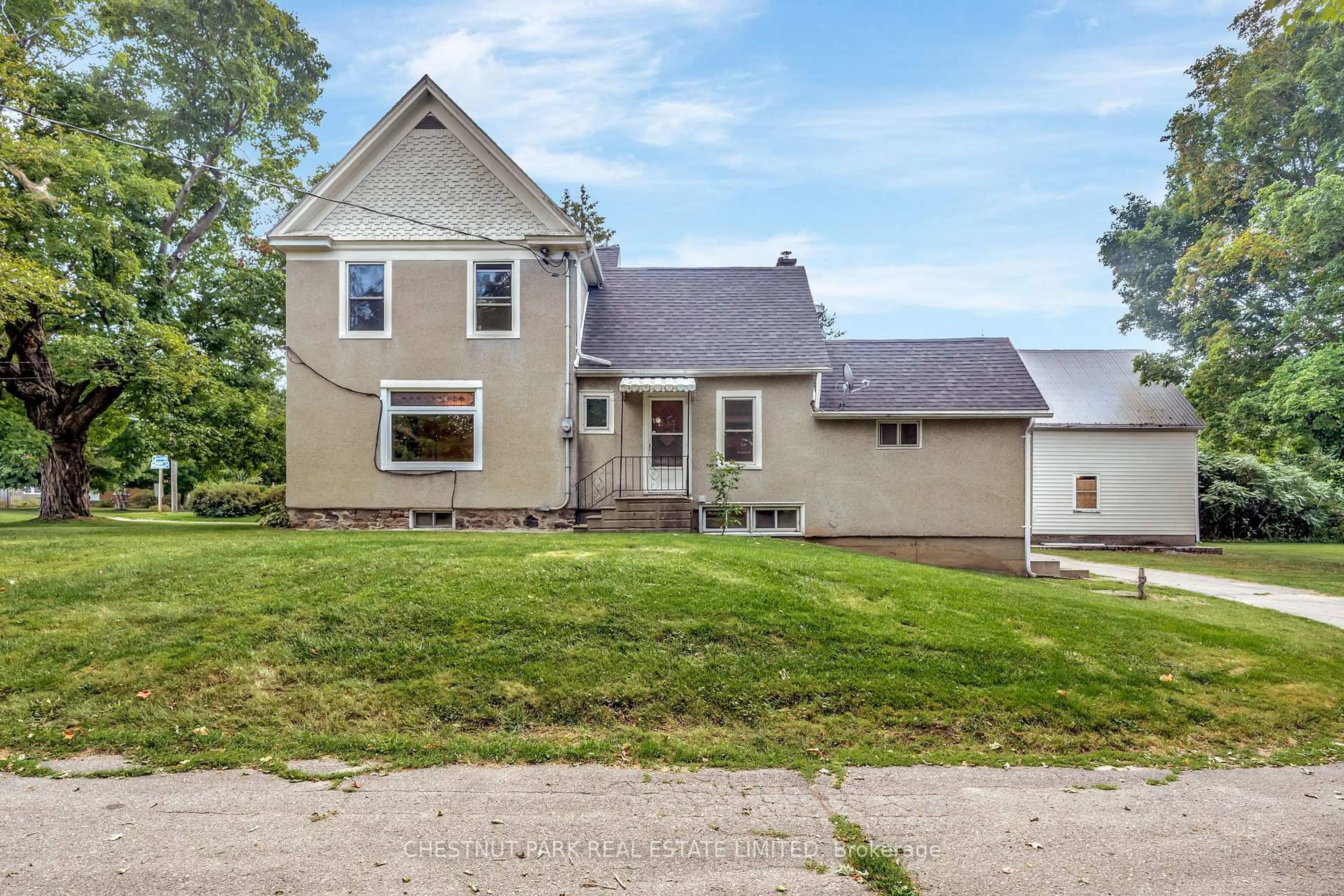 A pic from outside/outdoor area/front of a property/back of a property/a pic from drone, street for 385 Bloomfield Main St, Prince Edward County Ontario K0K 1G0