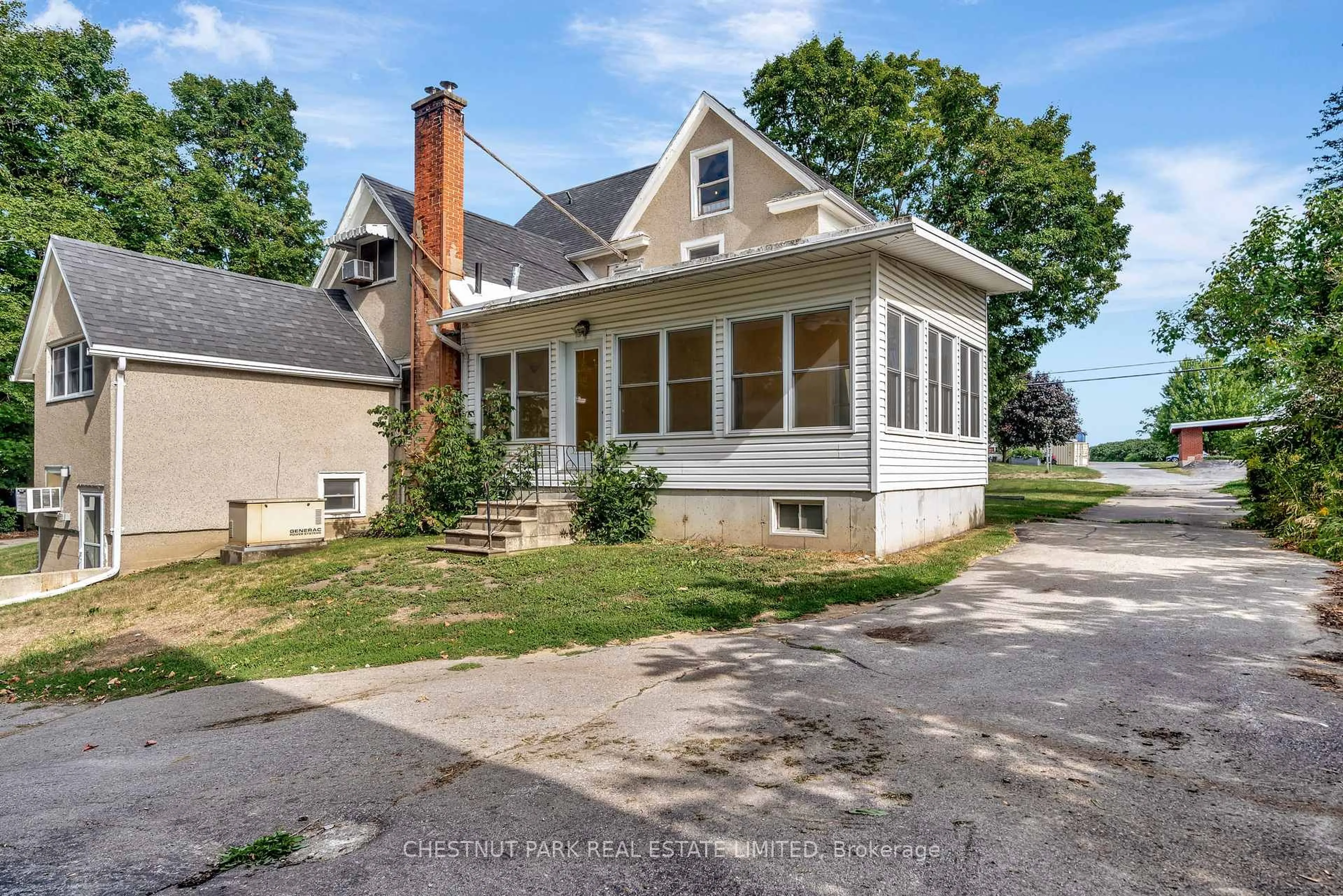 A pic from outside/outdoor area/front of a property/back of a property/a pic from drone, street for 385 Bloomfield Main St, Prince Edward County Ontario K0K 1G0