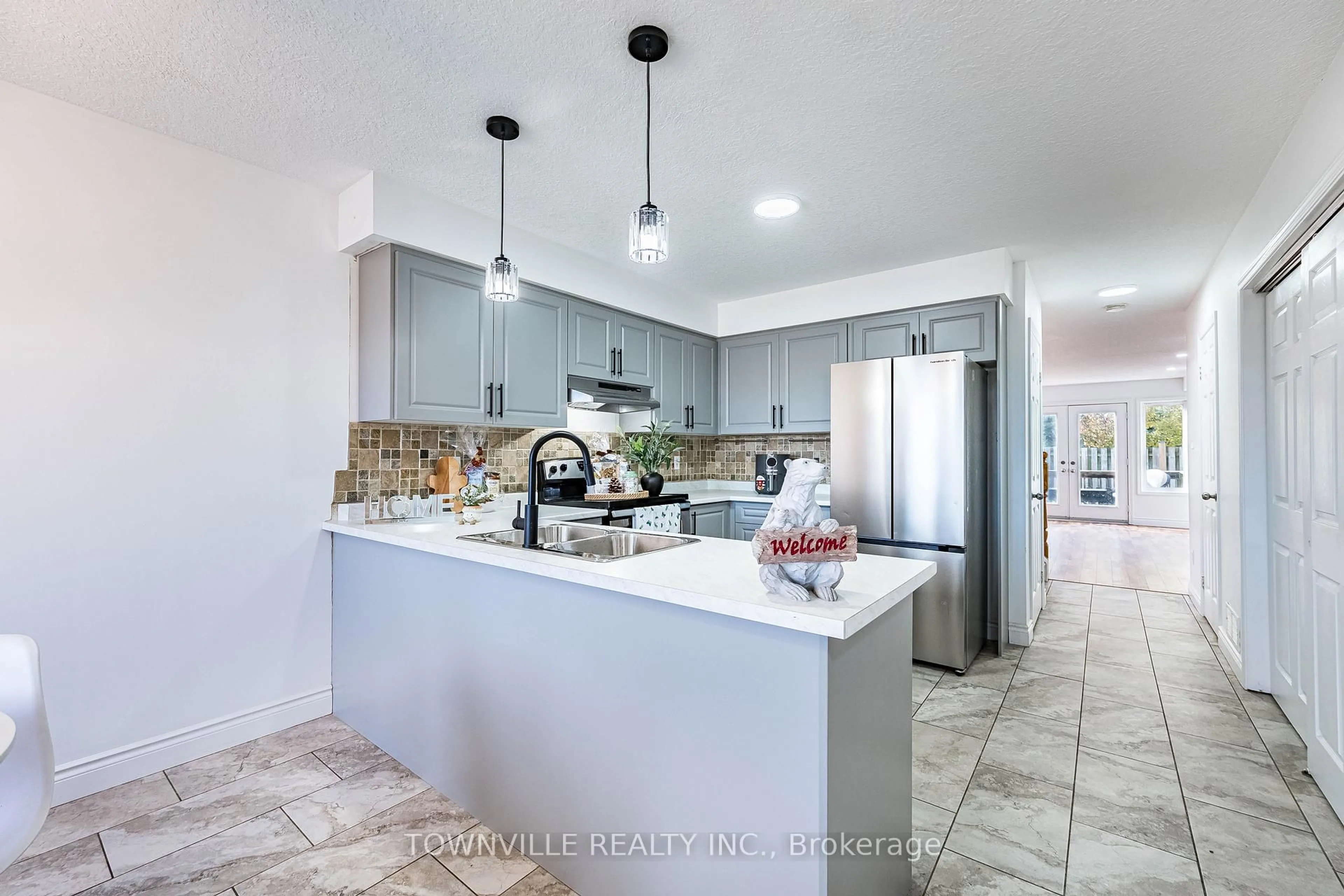 Open concept kitchen, ceramic/tile floor for 50 Howe Dr #5A, Kitchener Ontario N2E 0A3