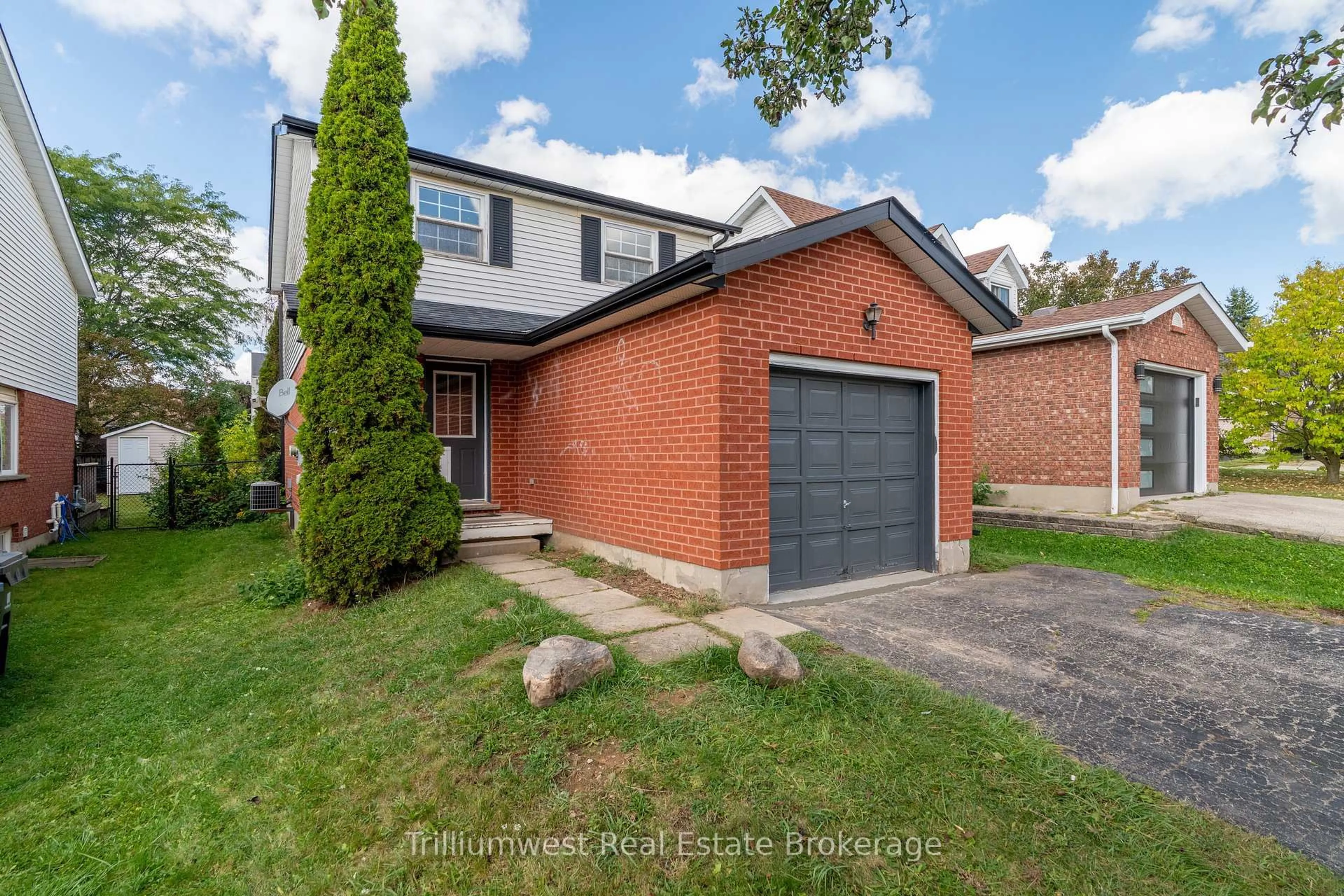 Home with brick exterior material, street for 25 Sidney Cres, Guelph Ontario N1G 4V1