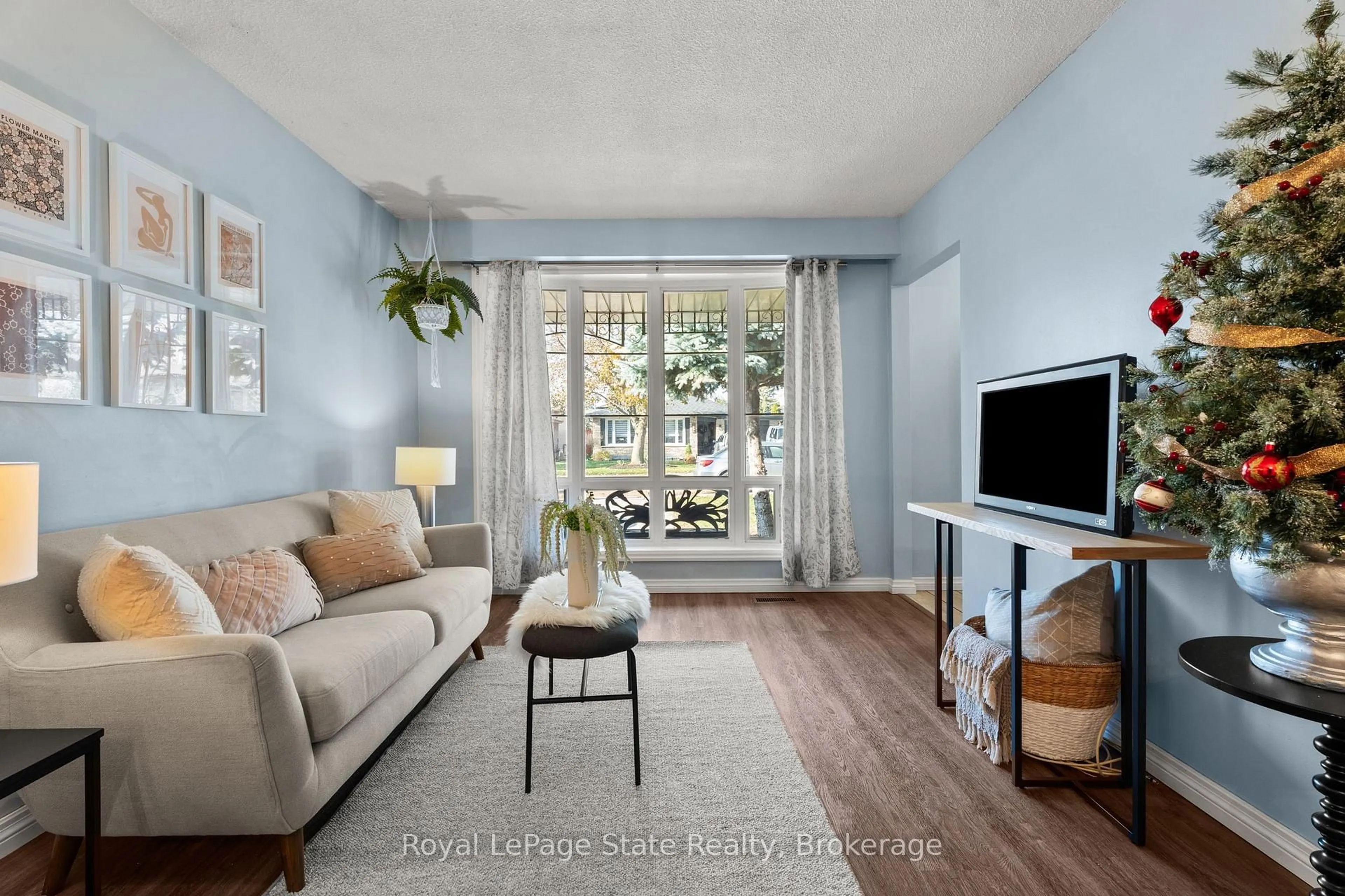 Living room with furniture, unknown for 215 Berkindale Dr, Hamilton Ontario L8E 2R6