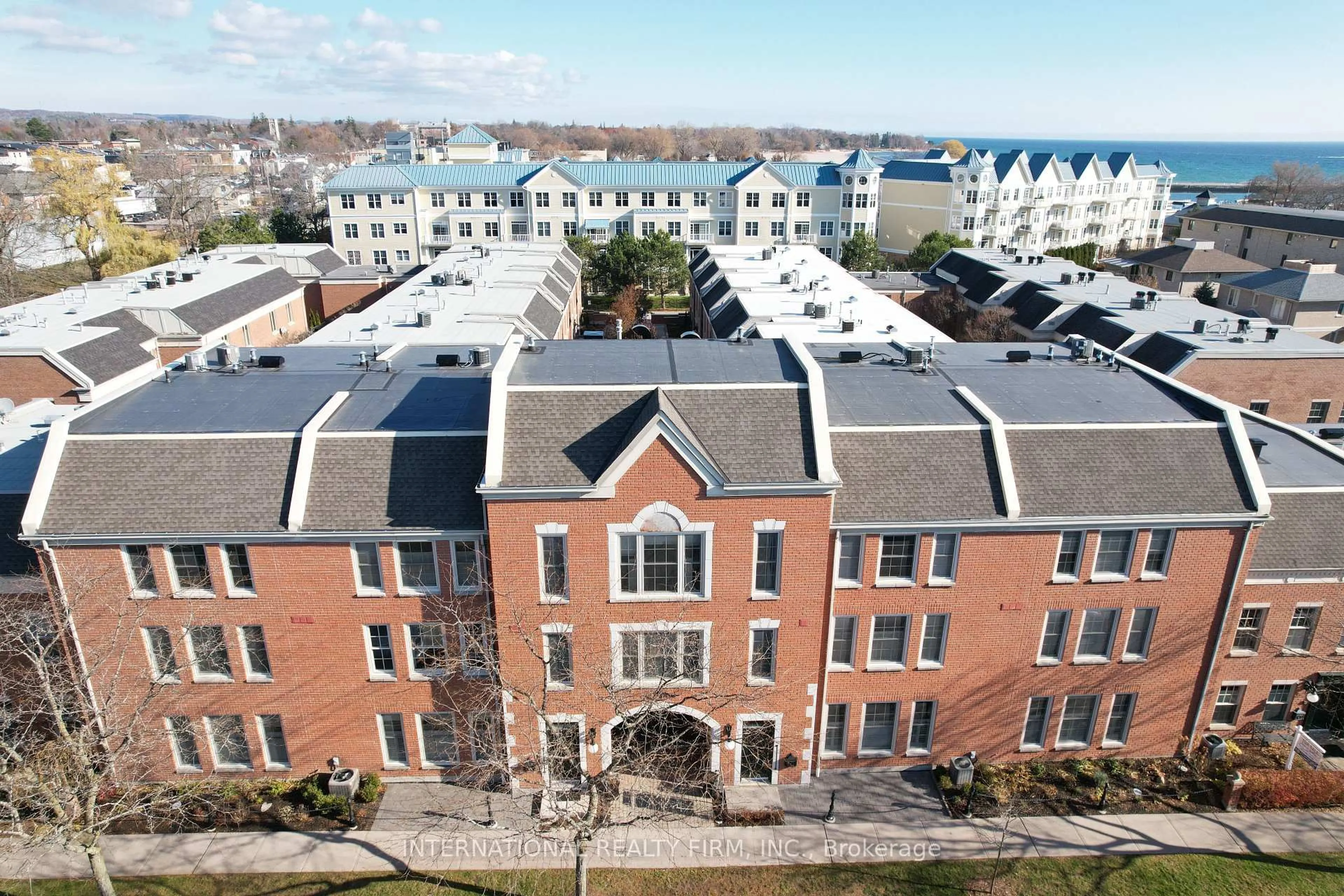 A pic from outside/outdoor area/front of a property/back of a property/a pic from drone, building for 138 Hibernia St #203, Cobourg Ontario K9A 3J8