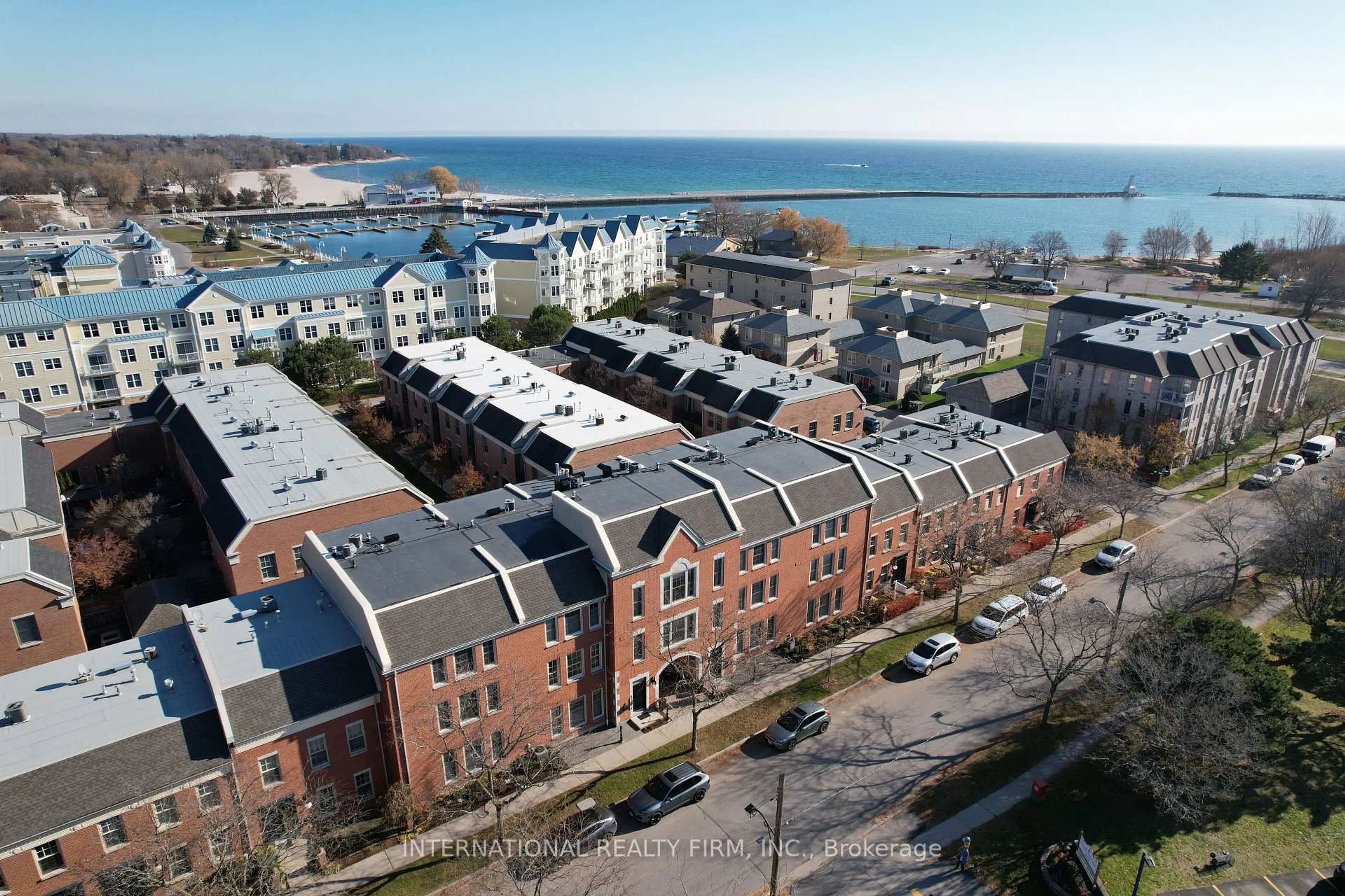 A pic from outside/outdoor area/front of a property/back of a property/a pic from drone, unknown for 138 Hibernia St #203, Cobourg Ontario K9A 3J8