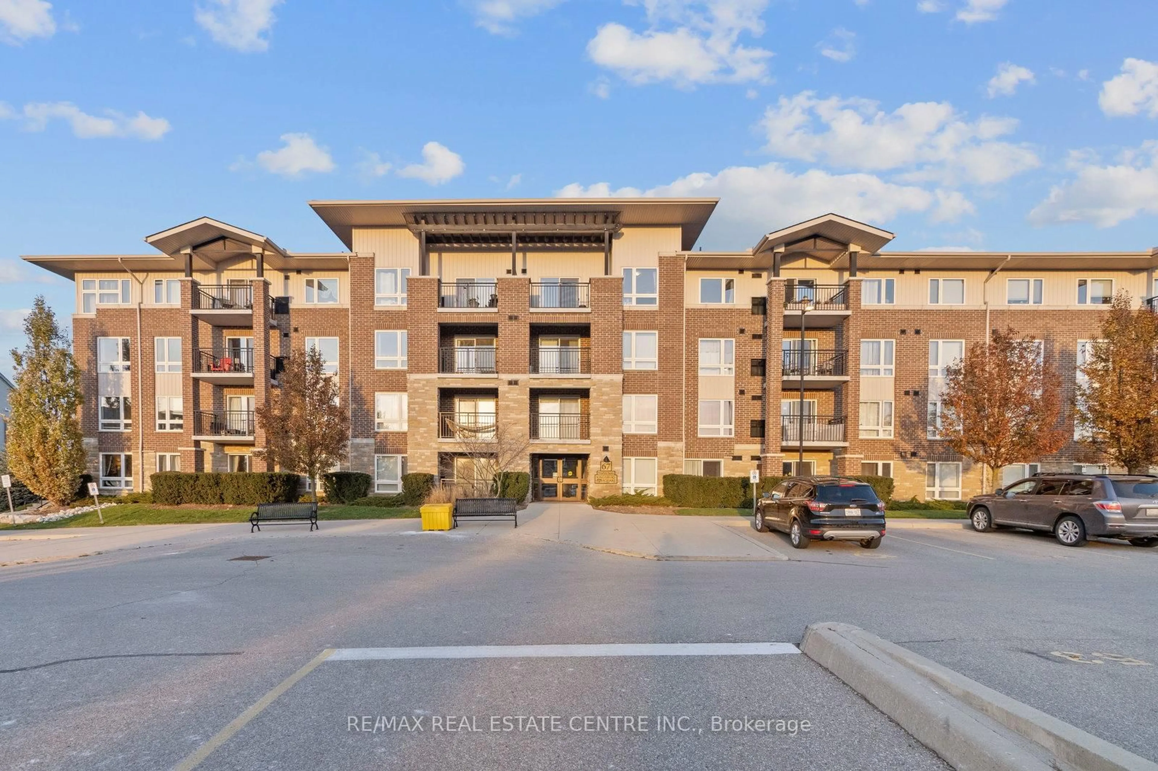 A pic from outside/outdoor area/front of a property/back of a property/a pic from drone, unknown for 67 Kingsbury Sq #304, Guelph Ontario N1L 0L3