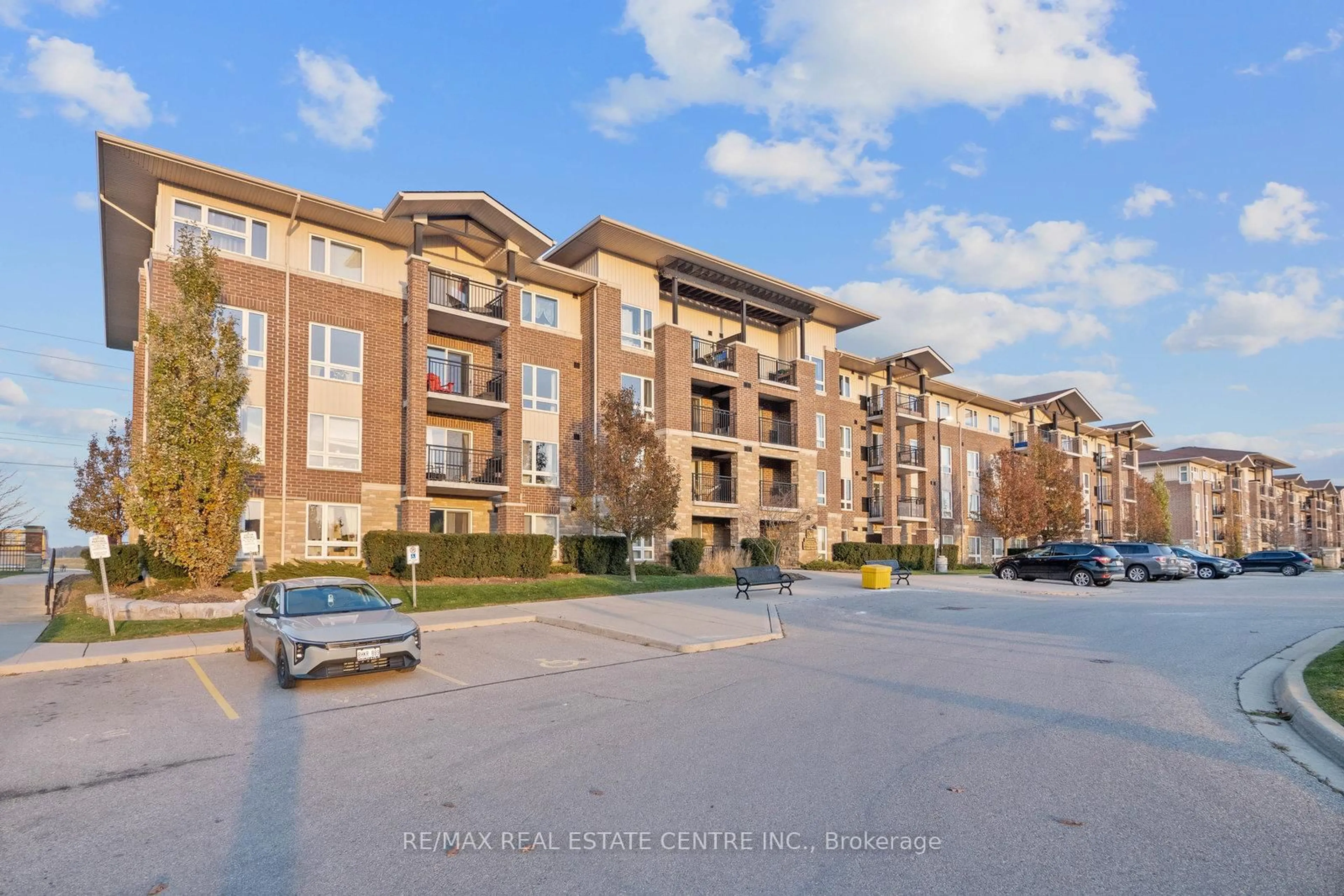 A pic from outside/outdoor area/front of a property/back of a property/a pic from drone, unknown for 67 Kingsbury Sq #304, Guelph Ontario N1L 0L3