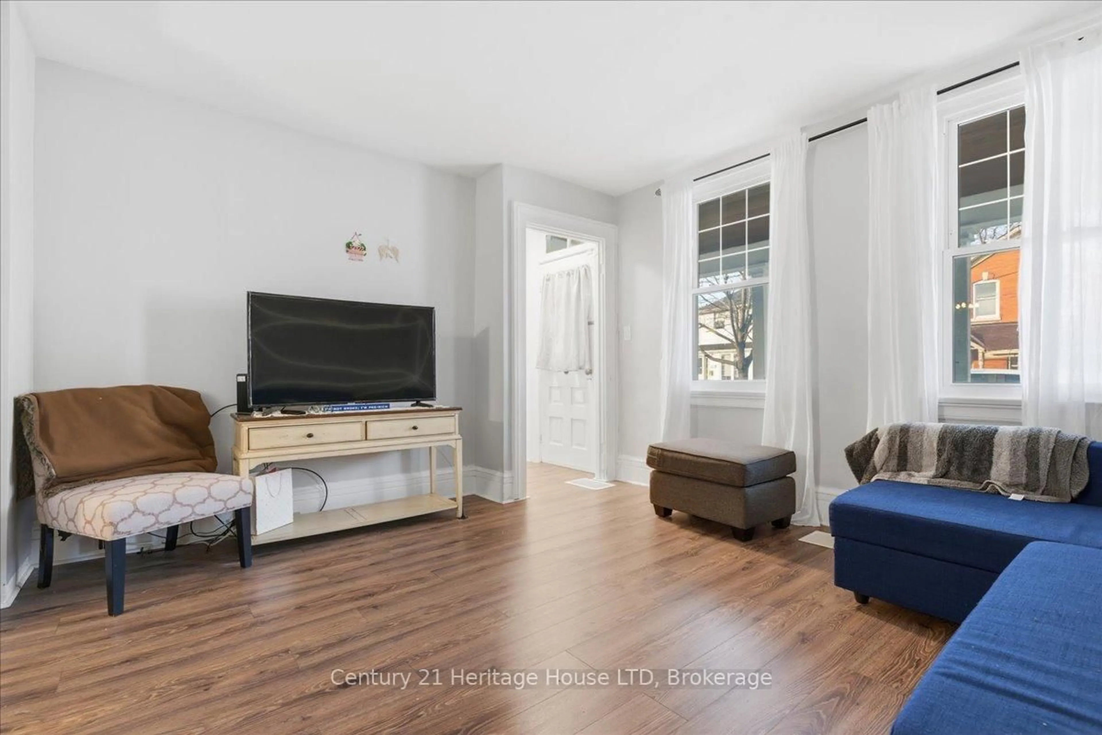 Living room with furniture, unknown for 4 Cross St, St. Catharines Ontario L2R 2W5