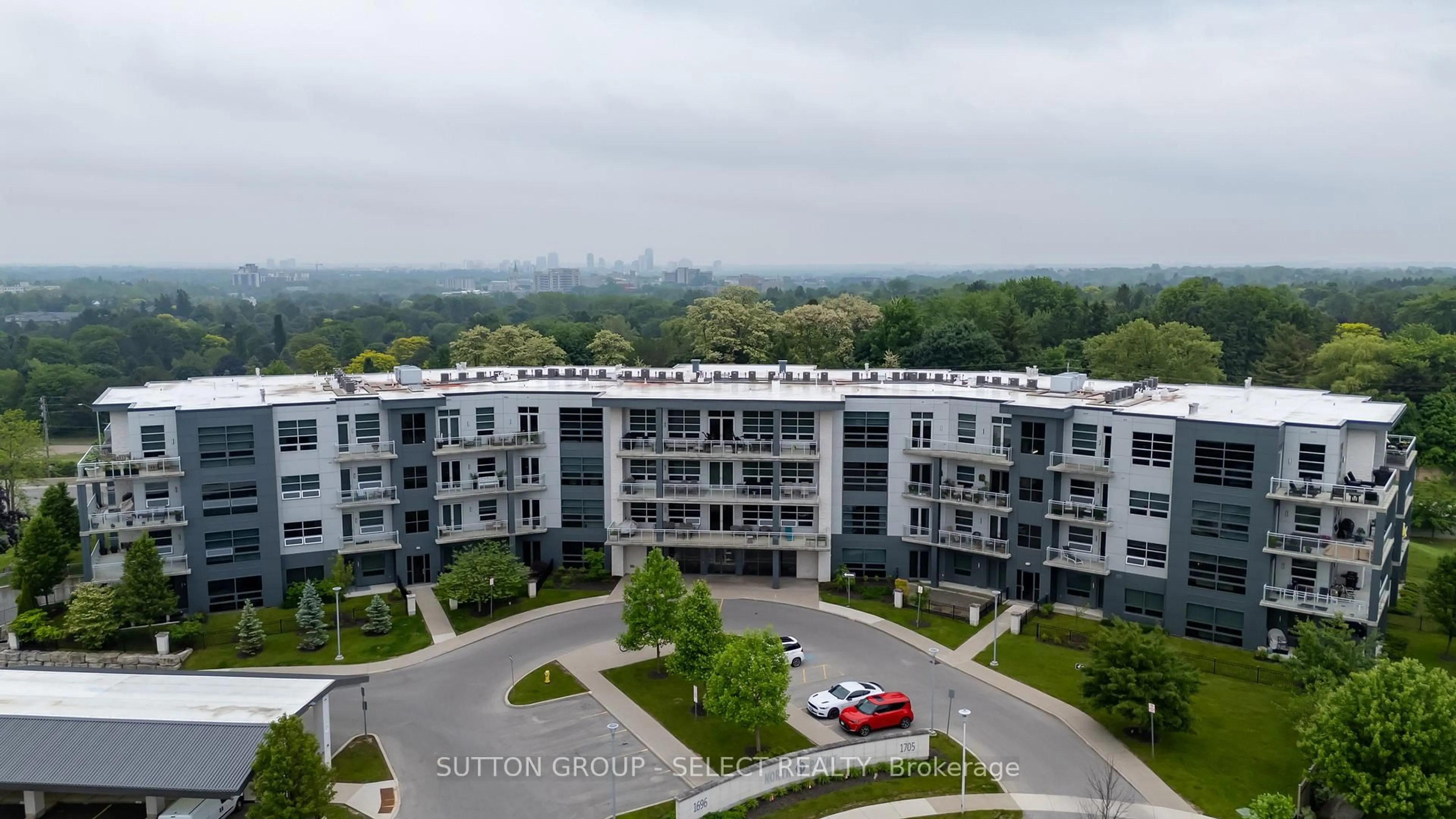 A pic from outside/outdoor area/front of a property/back of a property/a pic from drone, city buildings view from balcony for 1705 Fiddlehead Pl #209, London North Ontario N6G 5M6