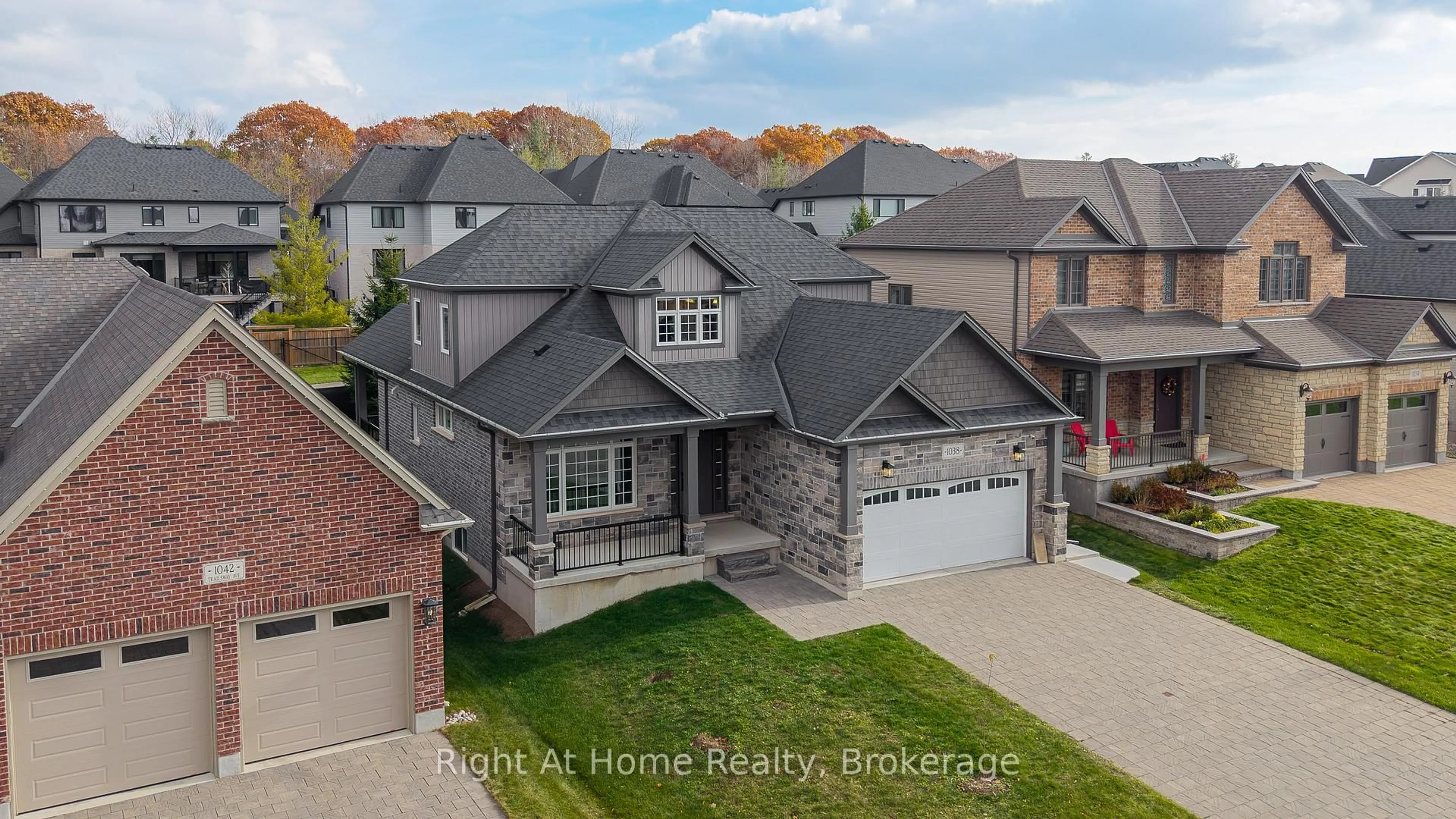 A pic from outside/outdoor area/front of a property/back of a property/a pic from drone, unknown for 1038 Trailsway Ave, London South Ontario N6K 0J2