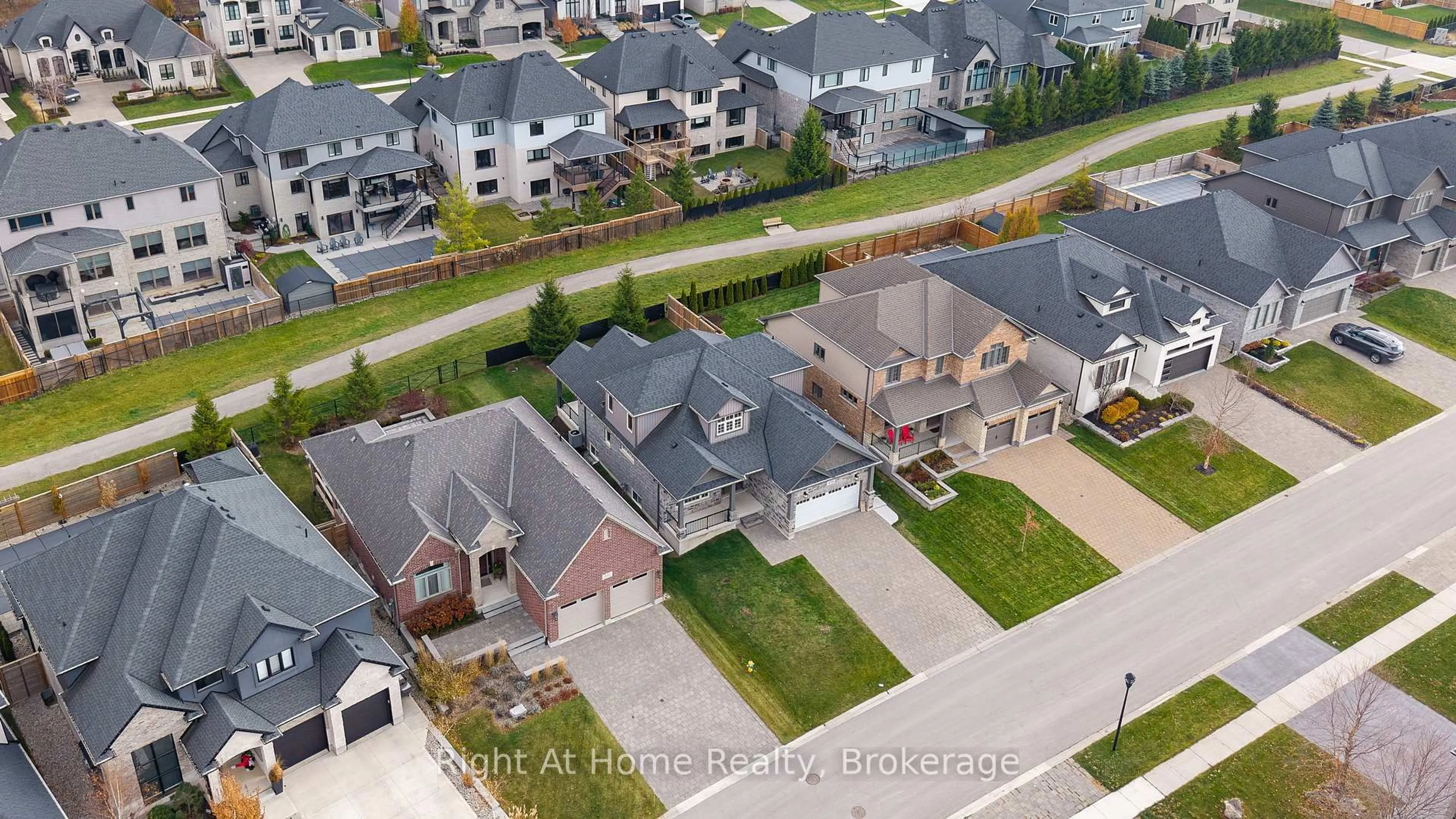 A pic from outside/outdoor area/front of a property/back of a property/a pic from drone, street for 1038 Trailsway Ave, London South Ontario N6K 0J2