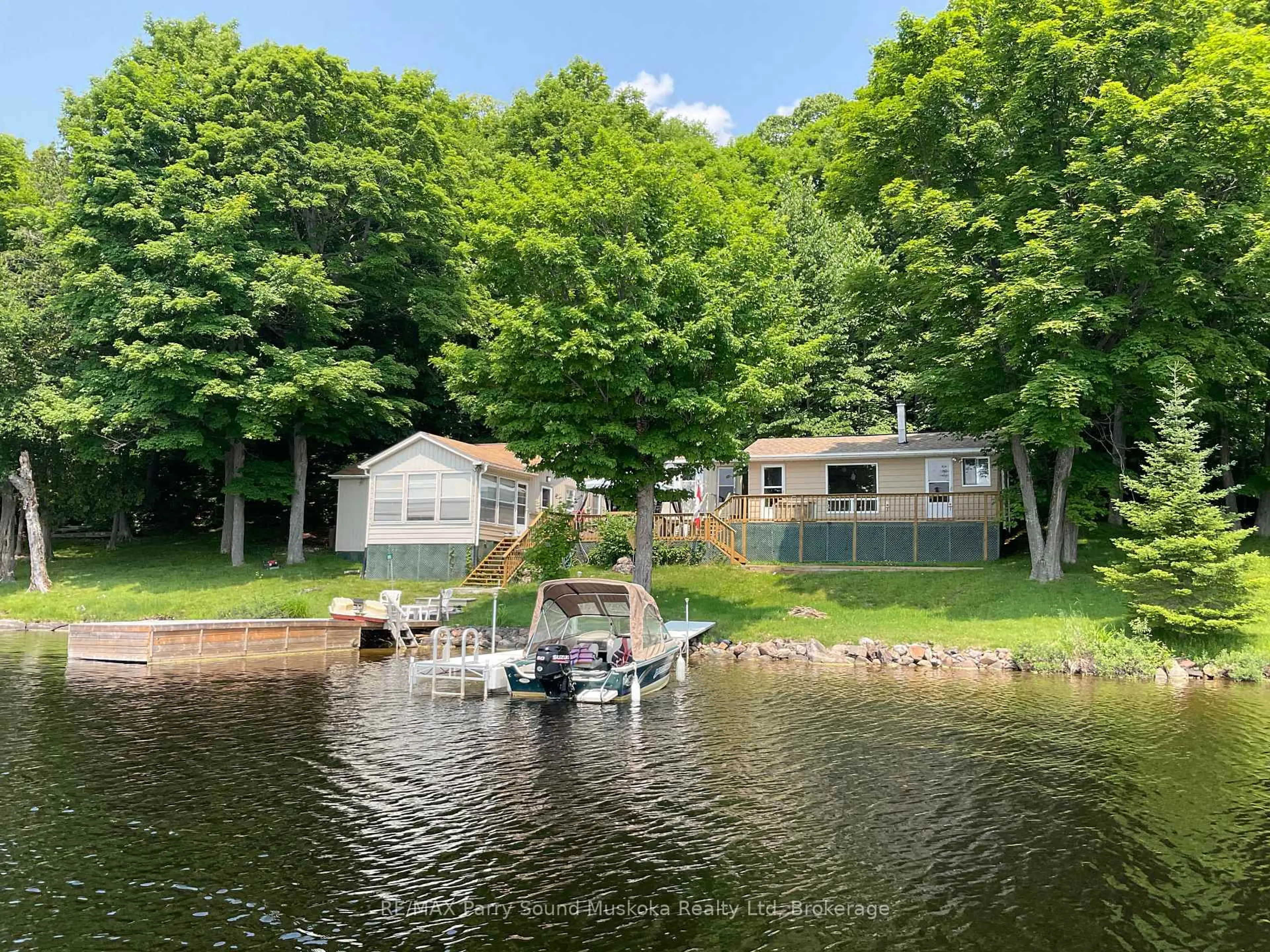 A pic from outside/outdoor area/front of a property/back of a property/a pic from drone, water/lake/river/ocean view for 185 WILSON, Parry Sound Remote Area Ontario P0H 1Y0