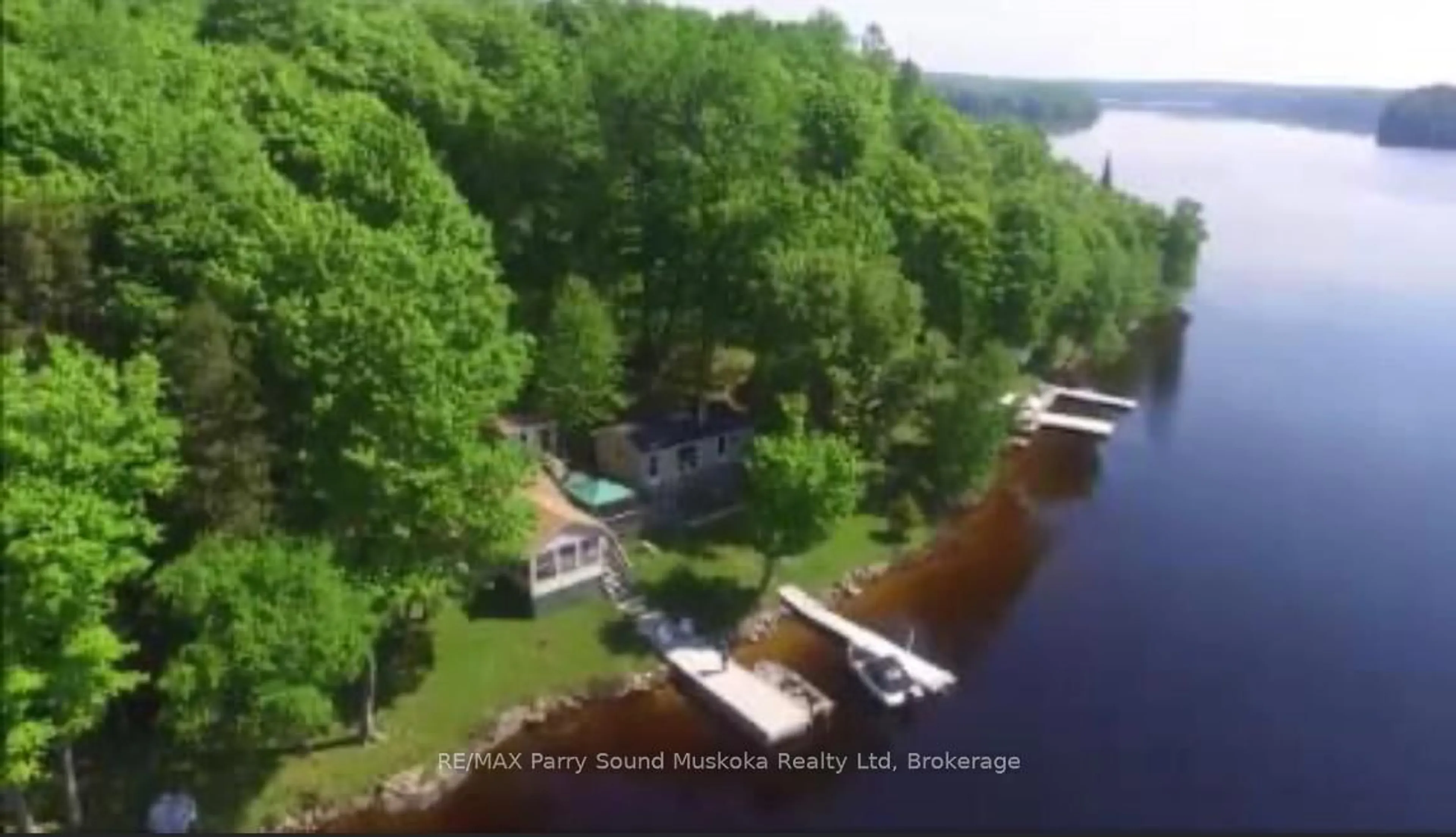A pic from outside/outdoor area/front of a property/back of a property/a pic from drone, water/lake/river/ocean view for 185 WILSON, Parry Sound Remote Area Ontario P0H 1Y0