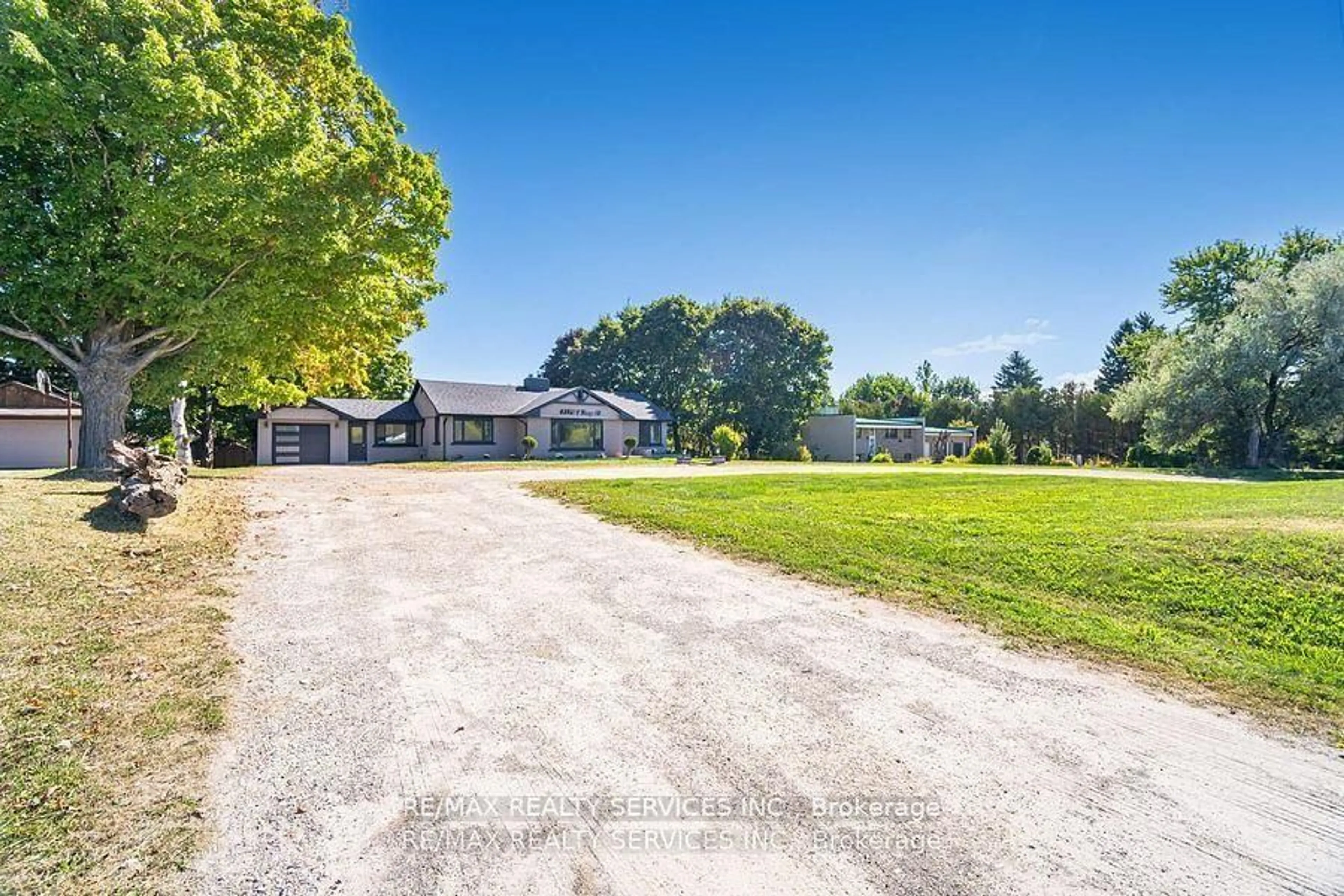 A pic from outside/outdoor area/front of a property/back of a property/a pic from drone, unknown for 633271 Hwy 10, Mono Ontario L9W 5P1