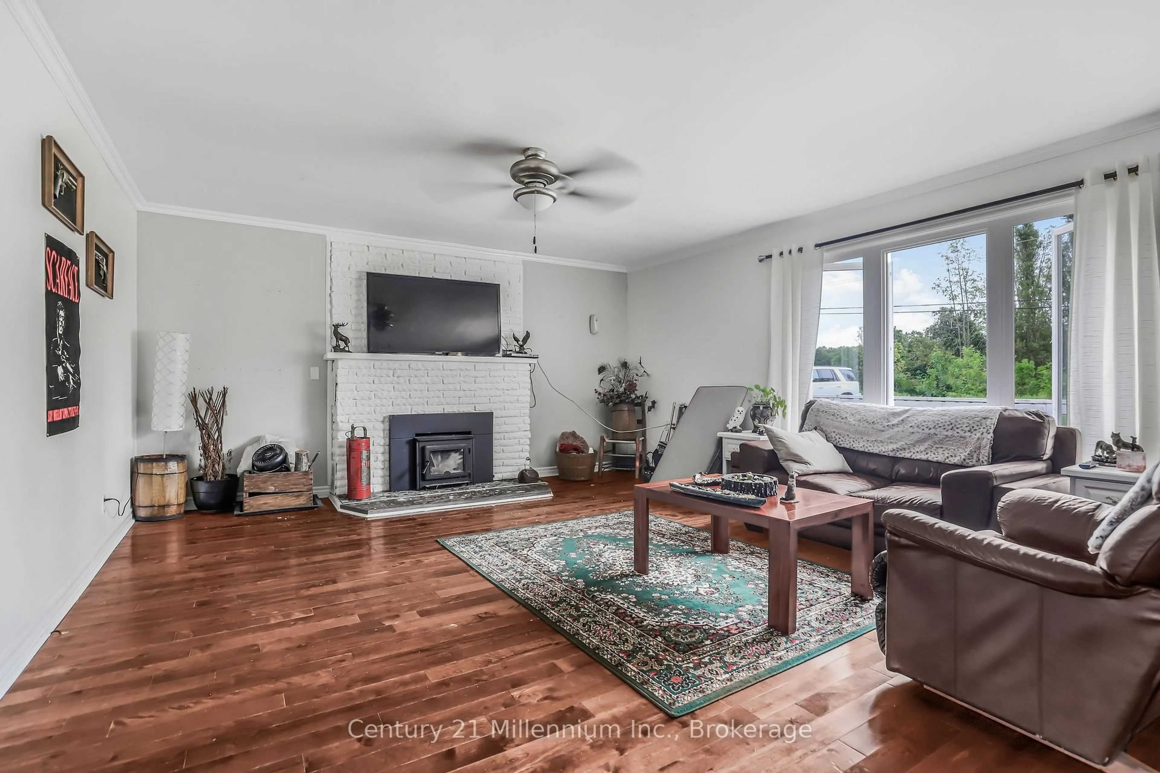 Living room with furniture, wood/laminate floor for 130 MAIN St, Northern Bruce Peninsula Ontario N0H 1W0